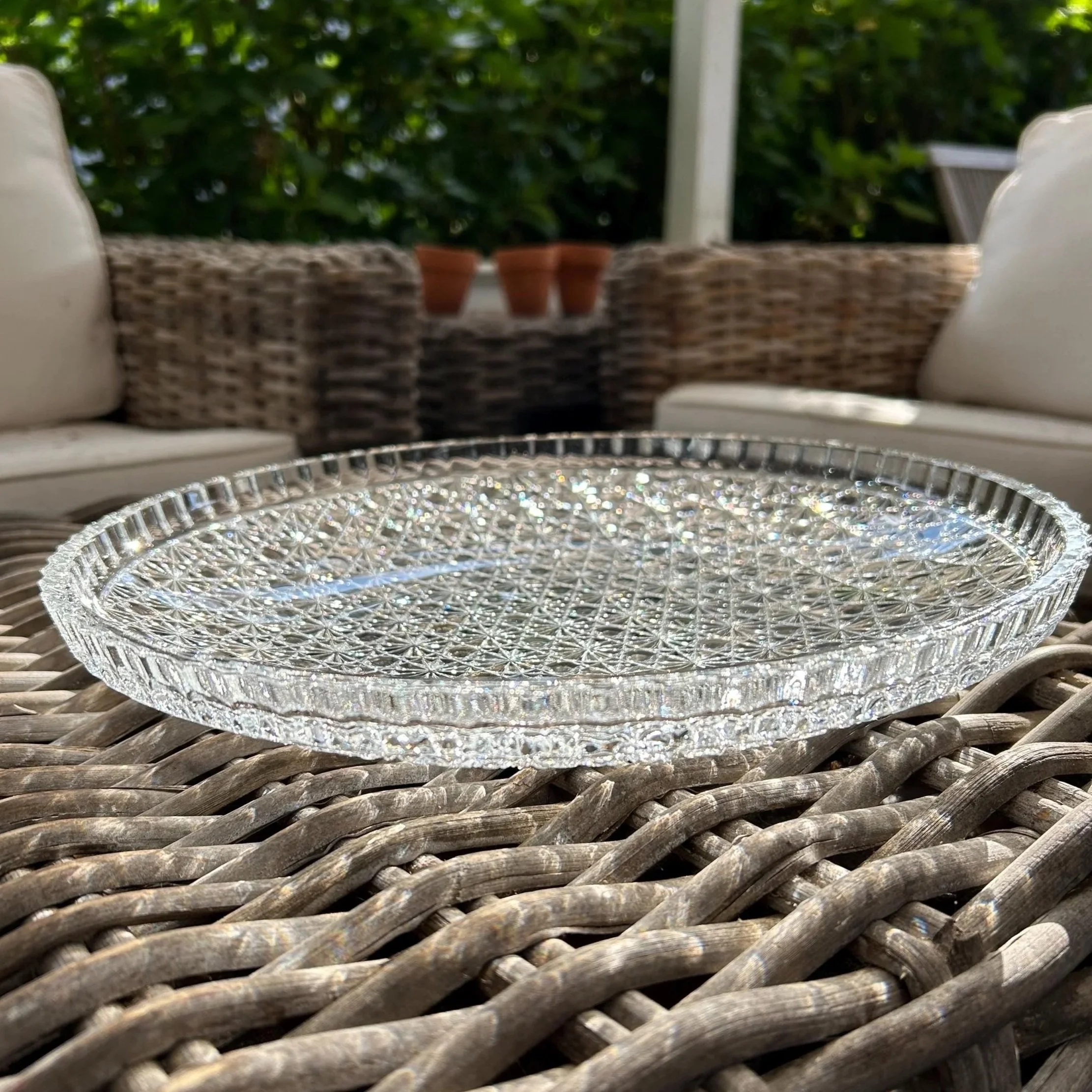 Side angle of platter resting on wicker table – shows height and clarity