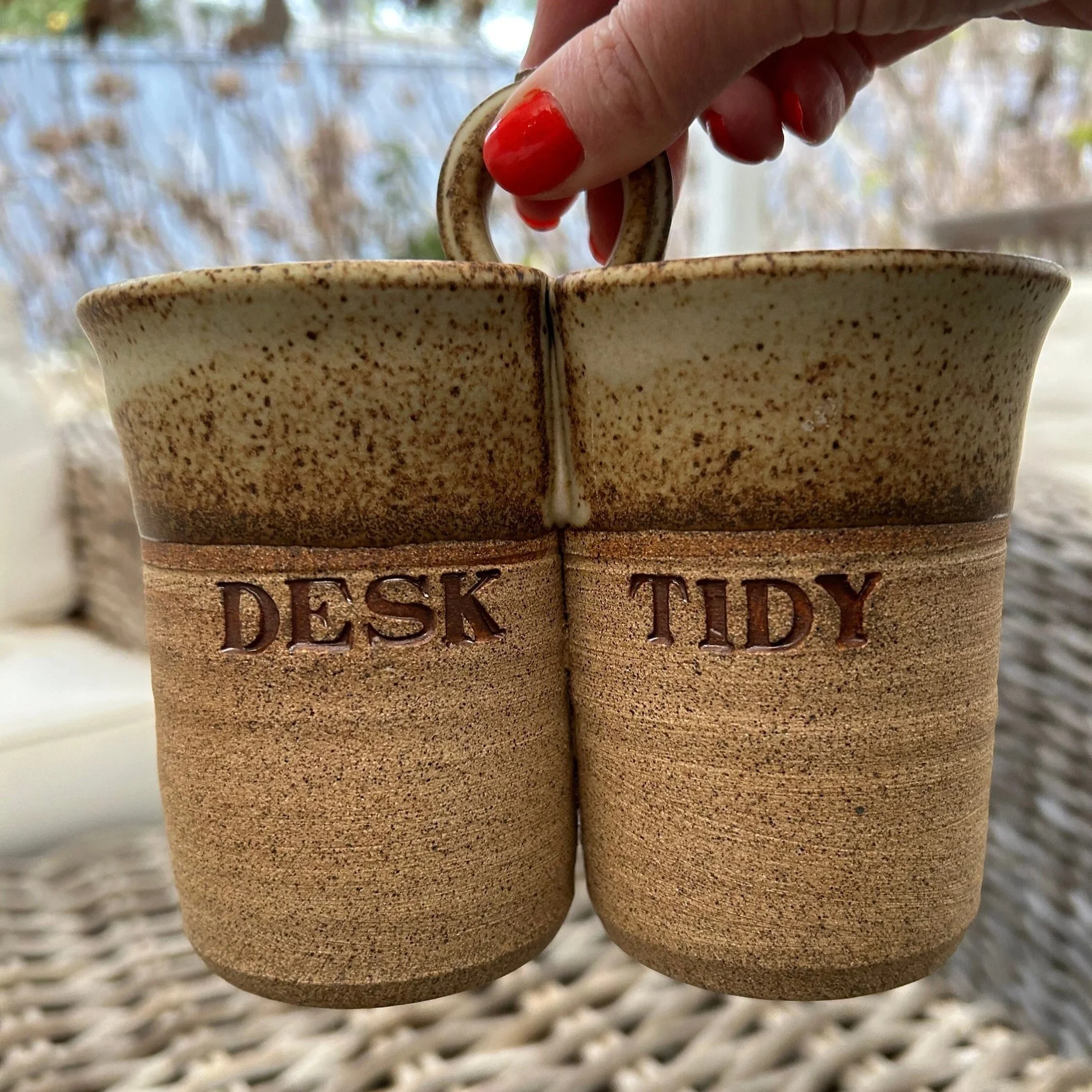 Handheld view showing full piece with handle and proportions