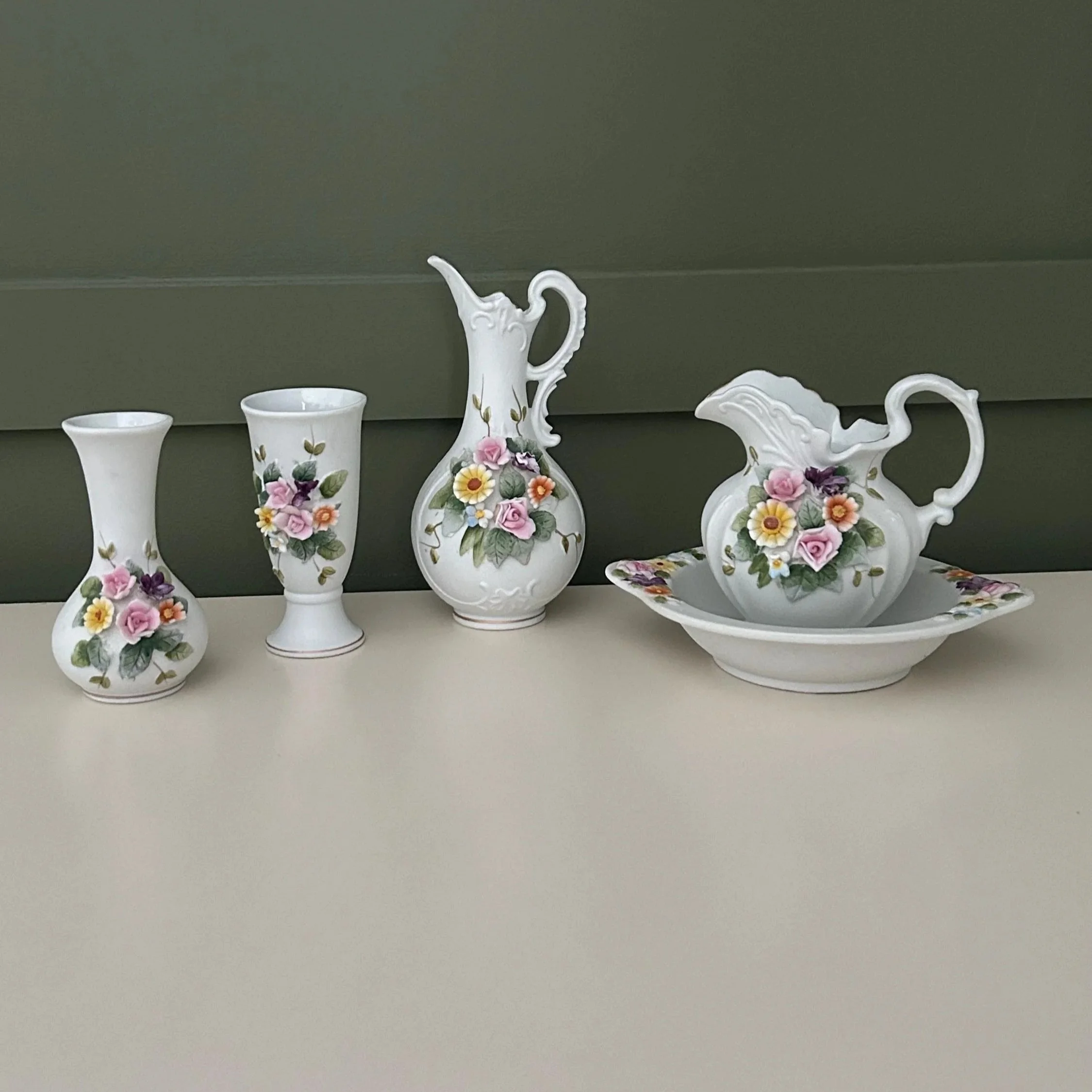 Group arrangement of all five Lefton floral pieces on display