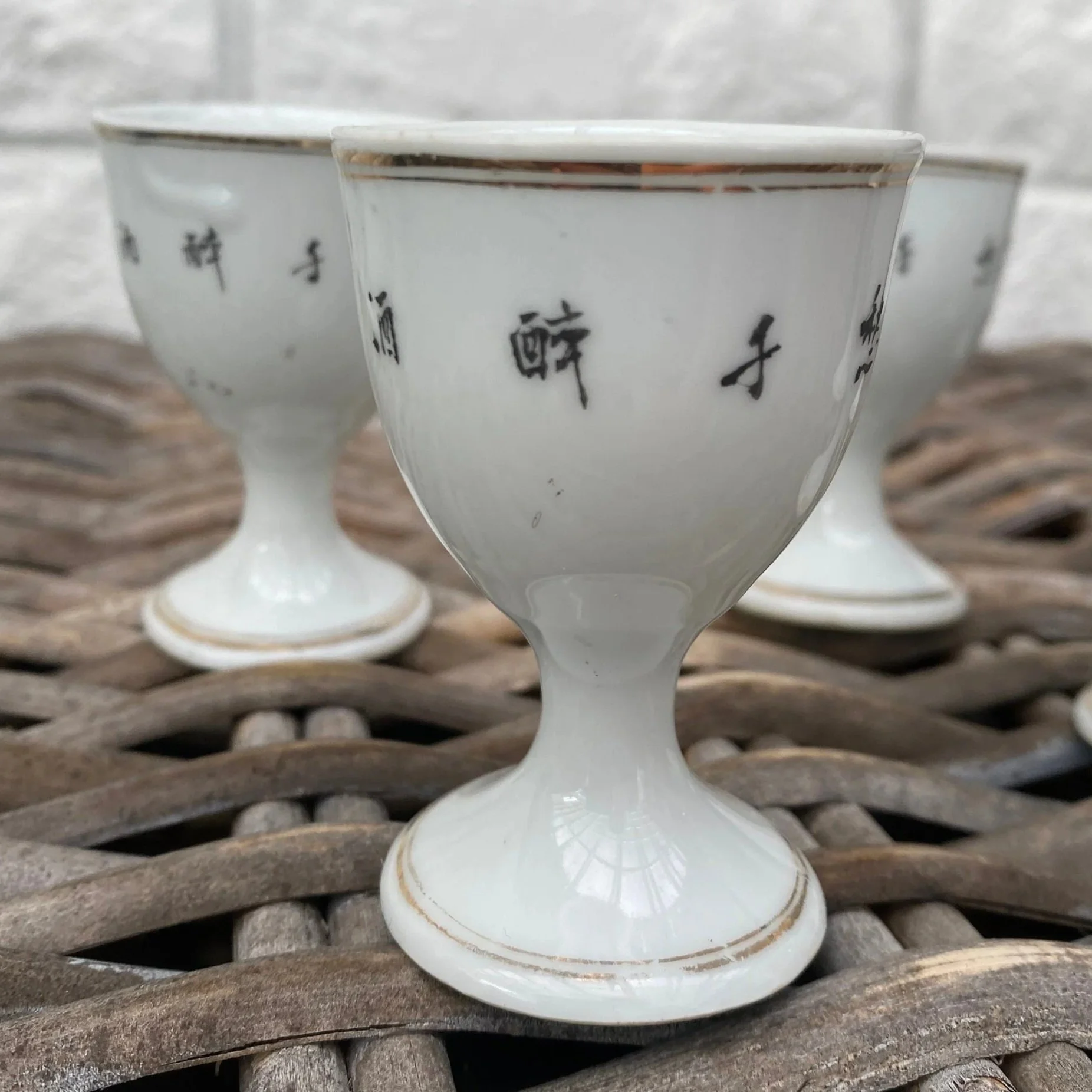 Close-up of Chinese calligraphy on rear side of glasses