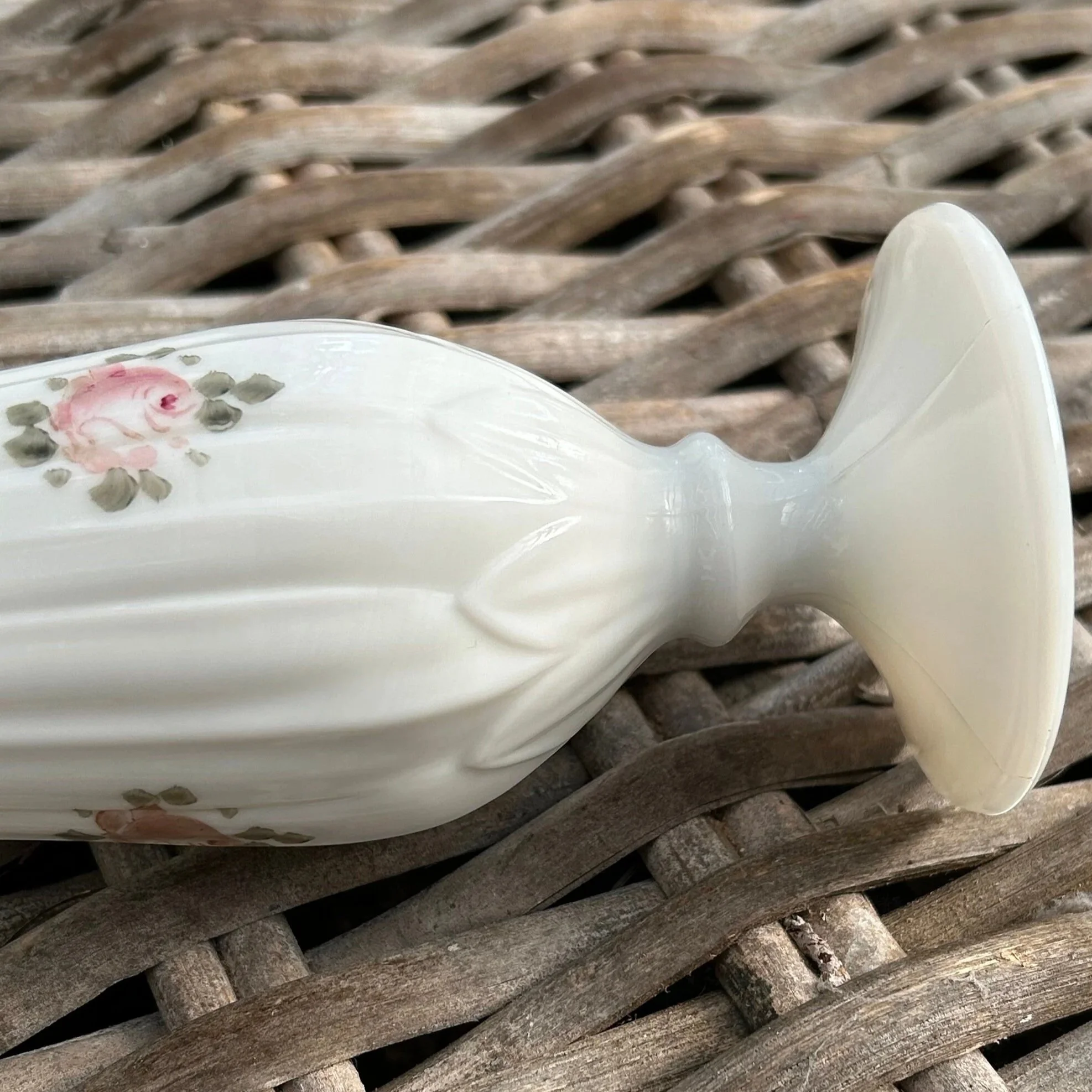 Side angle showing full hand-painted motif and vase base