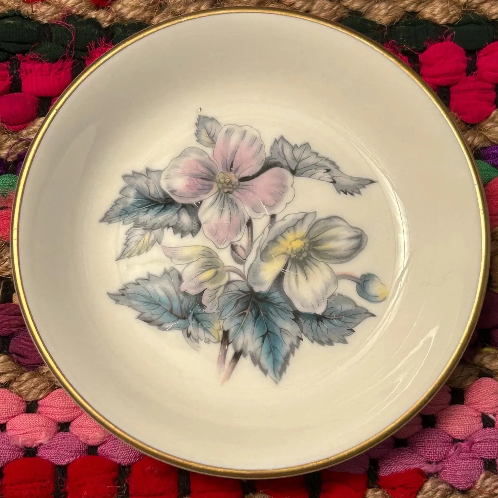 Top-down view of Royal Worcester pin dish showing Woodland floral design