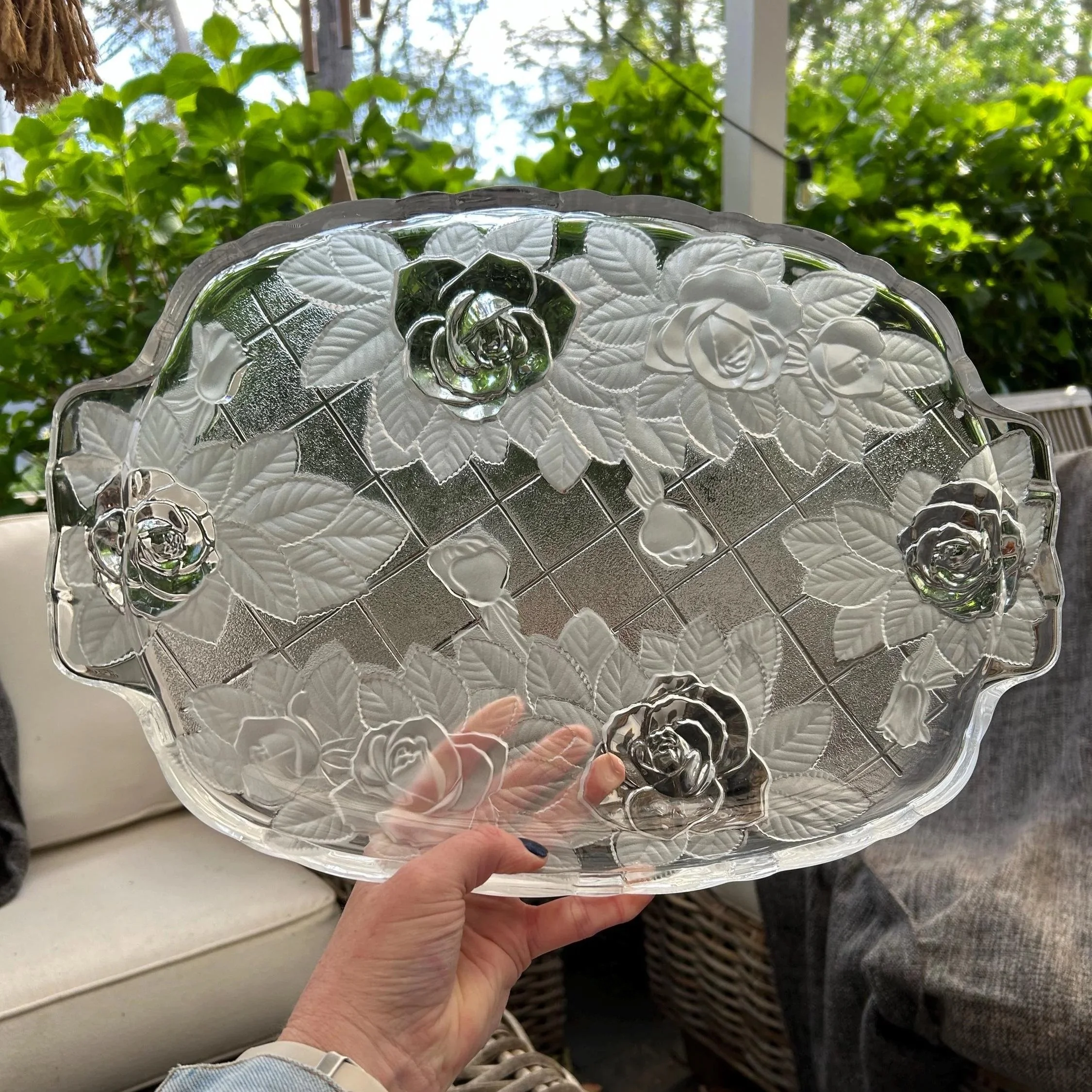 Mikasa frosted rose platter held outdoors – full view showing handles