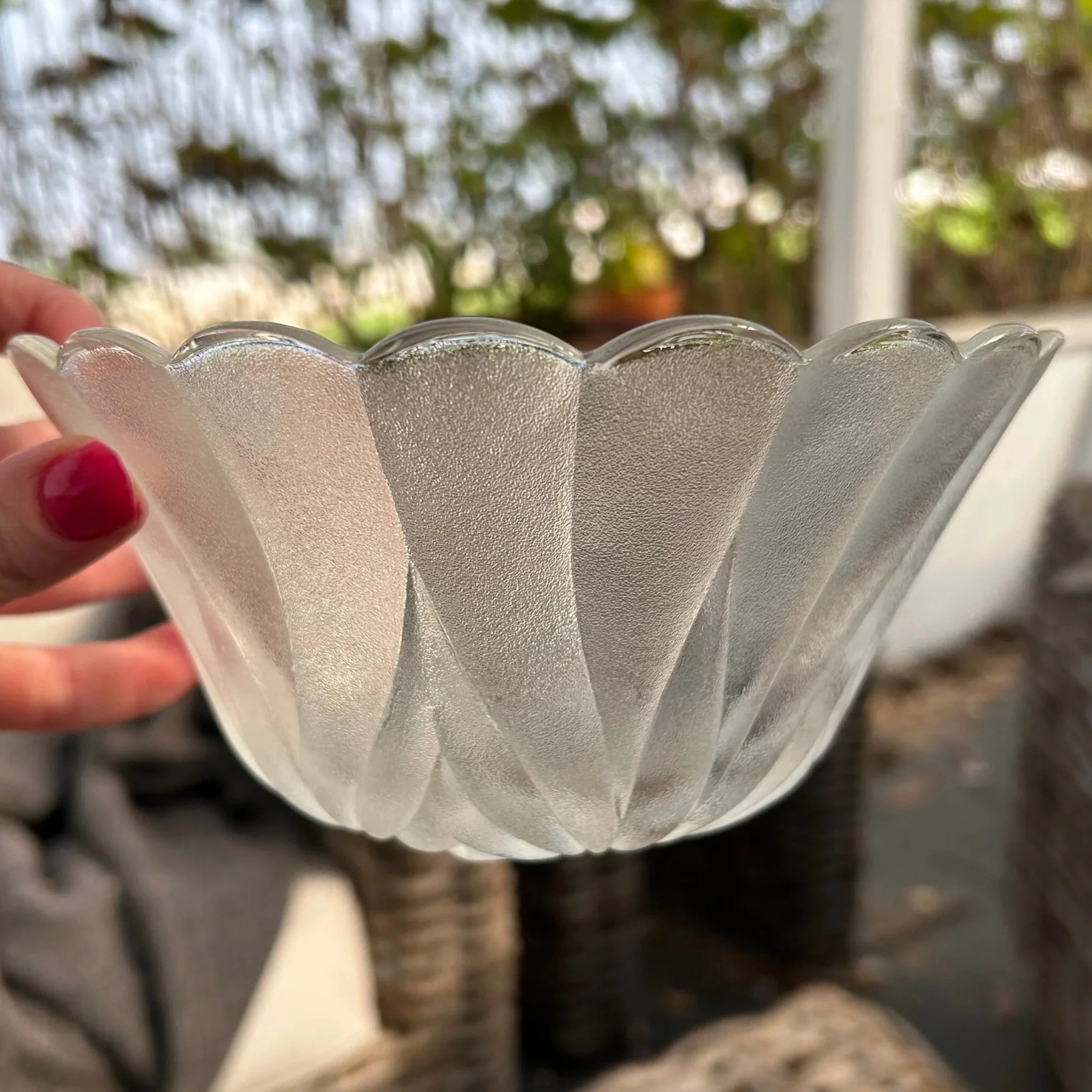 Side profile highlighting scalloped rim and frosted finish