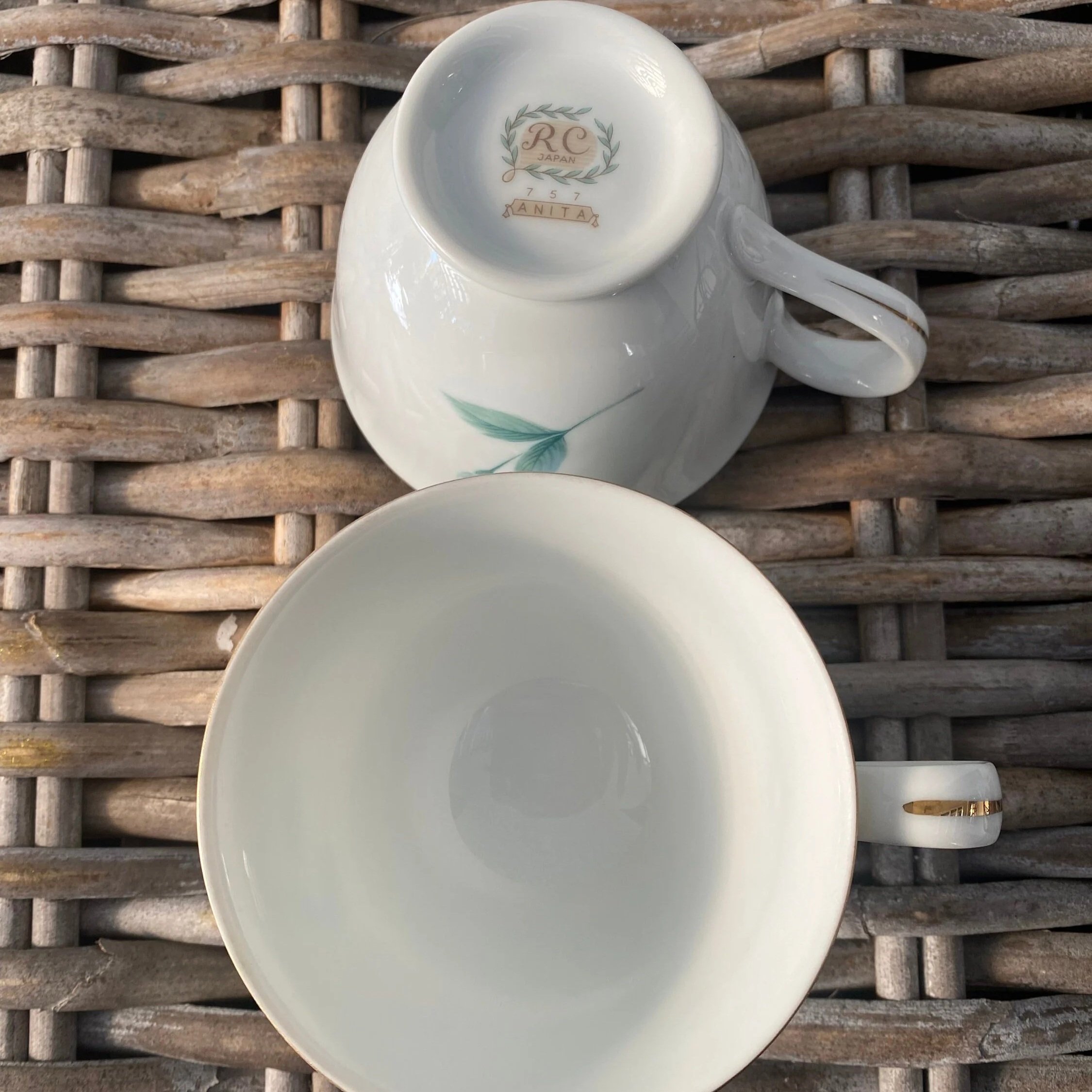 Underside of teacups showing base stamp “RC Japan Anita”