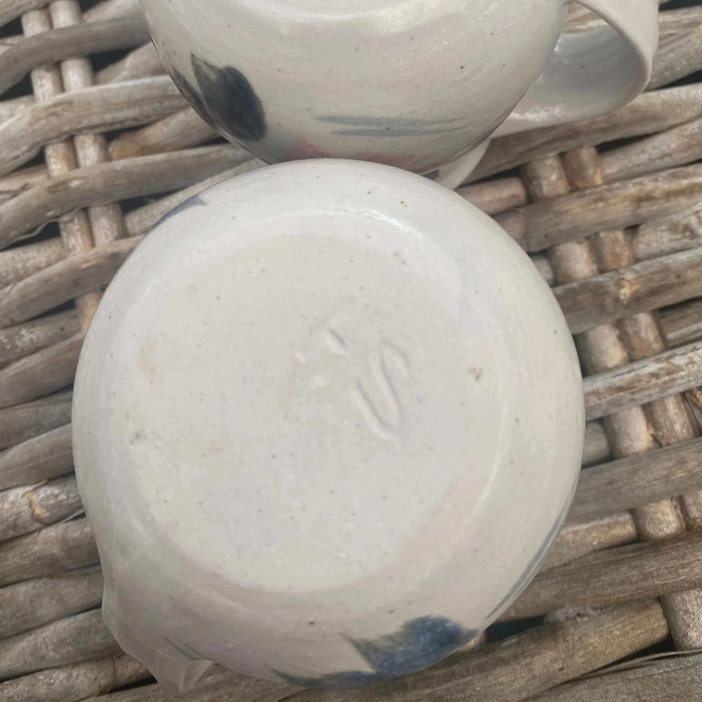 Base of mug showing impressed maker’s mark