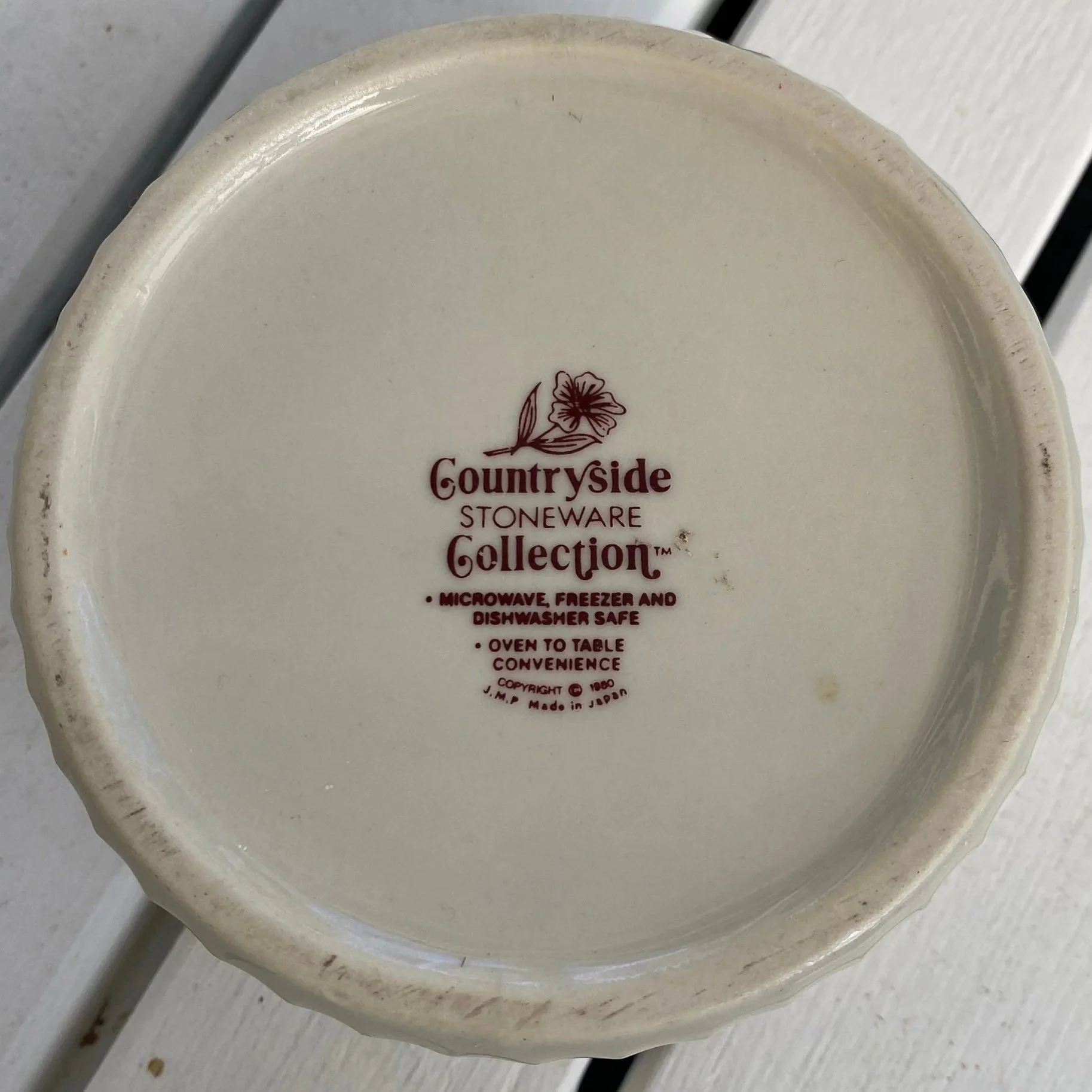 Underside of ramekin showing maker’s mark "Countryside Stoneware Collection – Made in Japan"