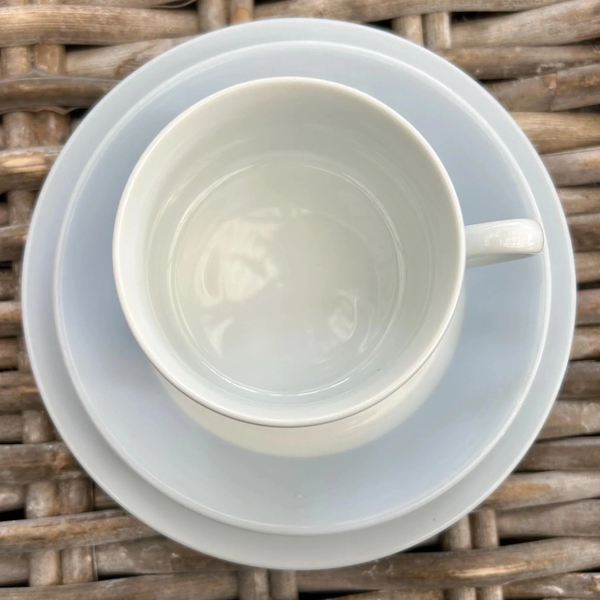Overhead angle of single trio set – flat cup on saucer and plate