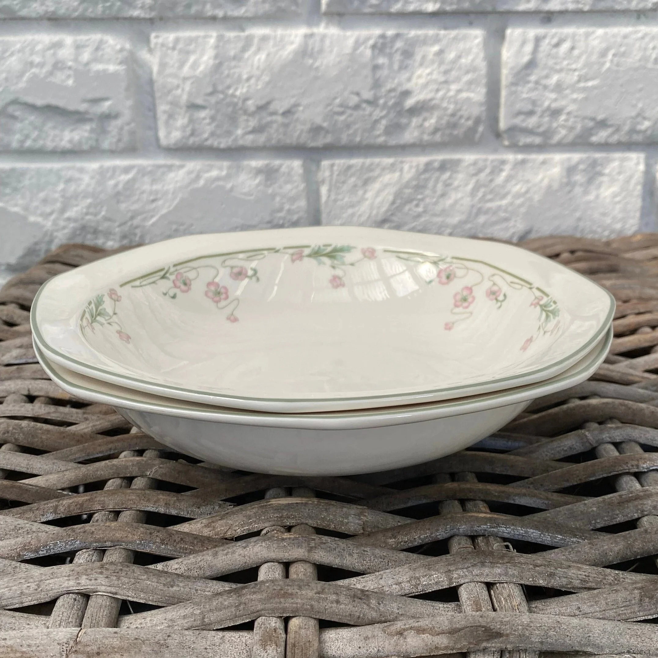 Side view showing shallow profile and layered bowl stacking