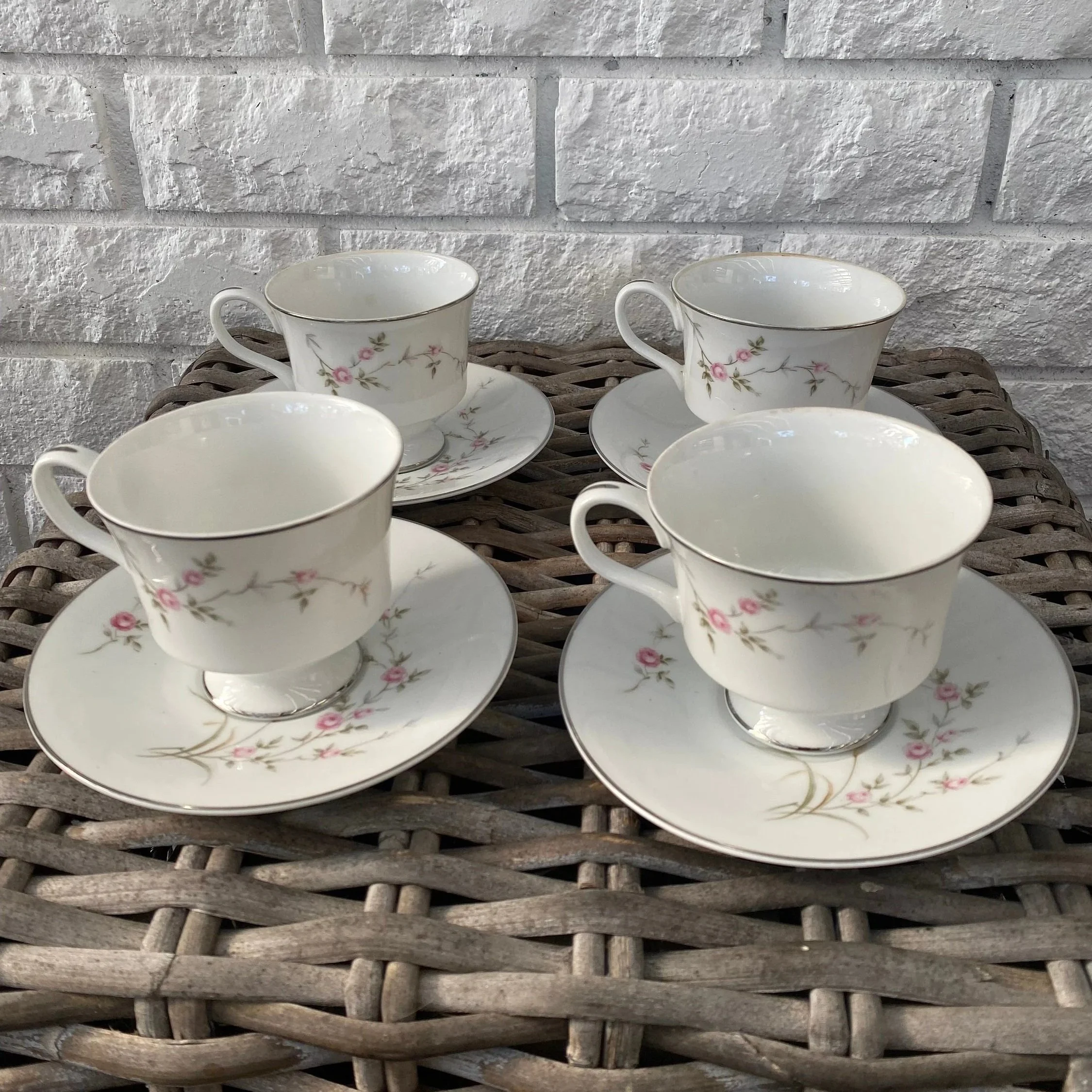 Group shot of full 4-piece cup and saucer set