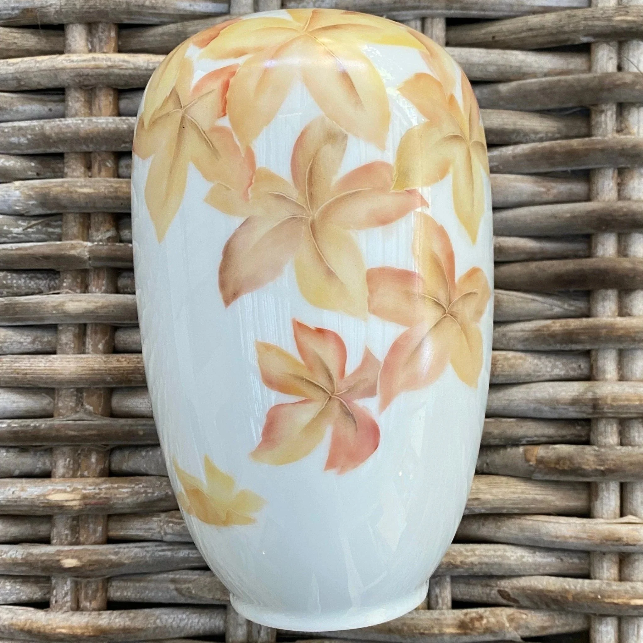 Front view of Hutschenreuther porcelain vase with hand-painted autumn leaves
