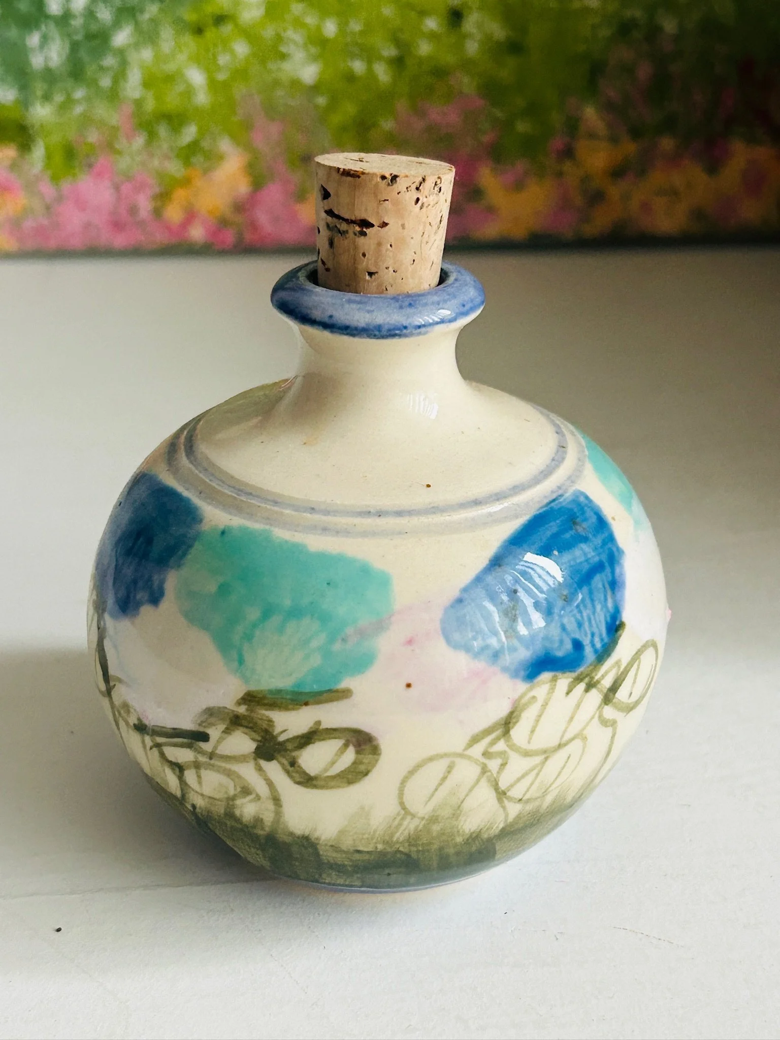 Single shaker photographed upright with cork stopper, showing full body shape and colourful hand-painted pattern