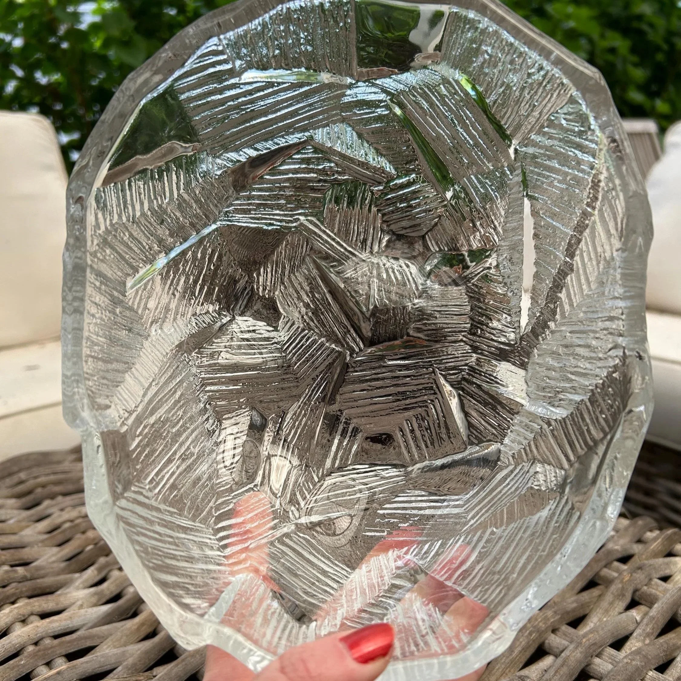 Bowl held upright showing internal textured pattern and organic shape