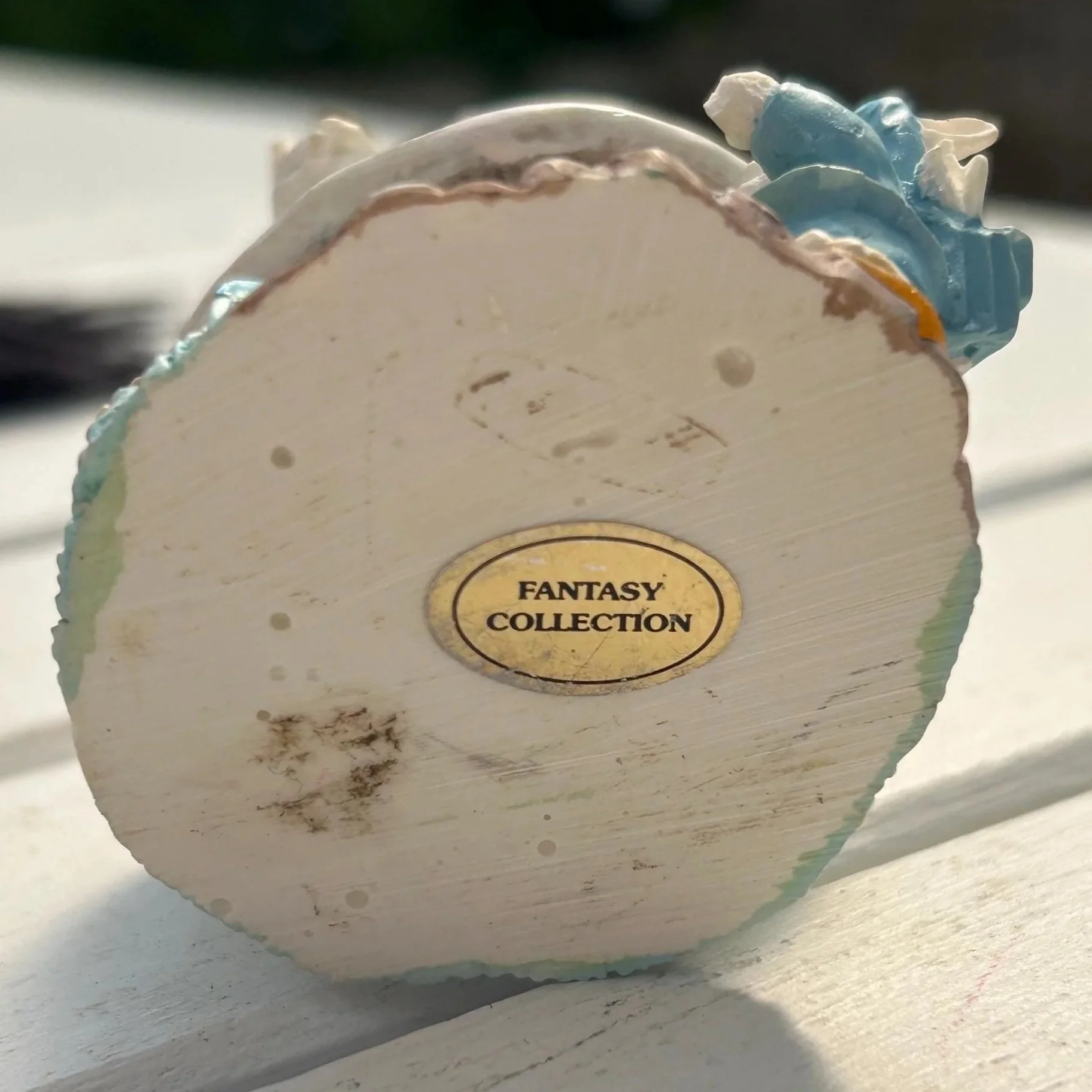 Base showing original Fantasy Collection gold label