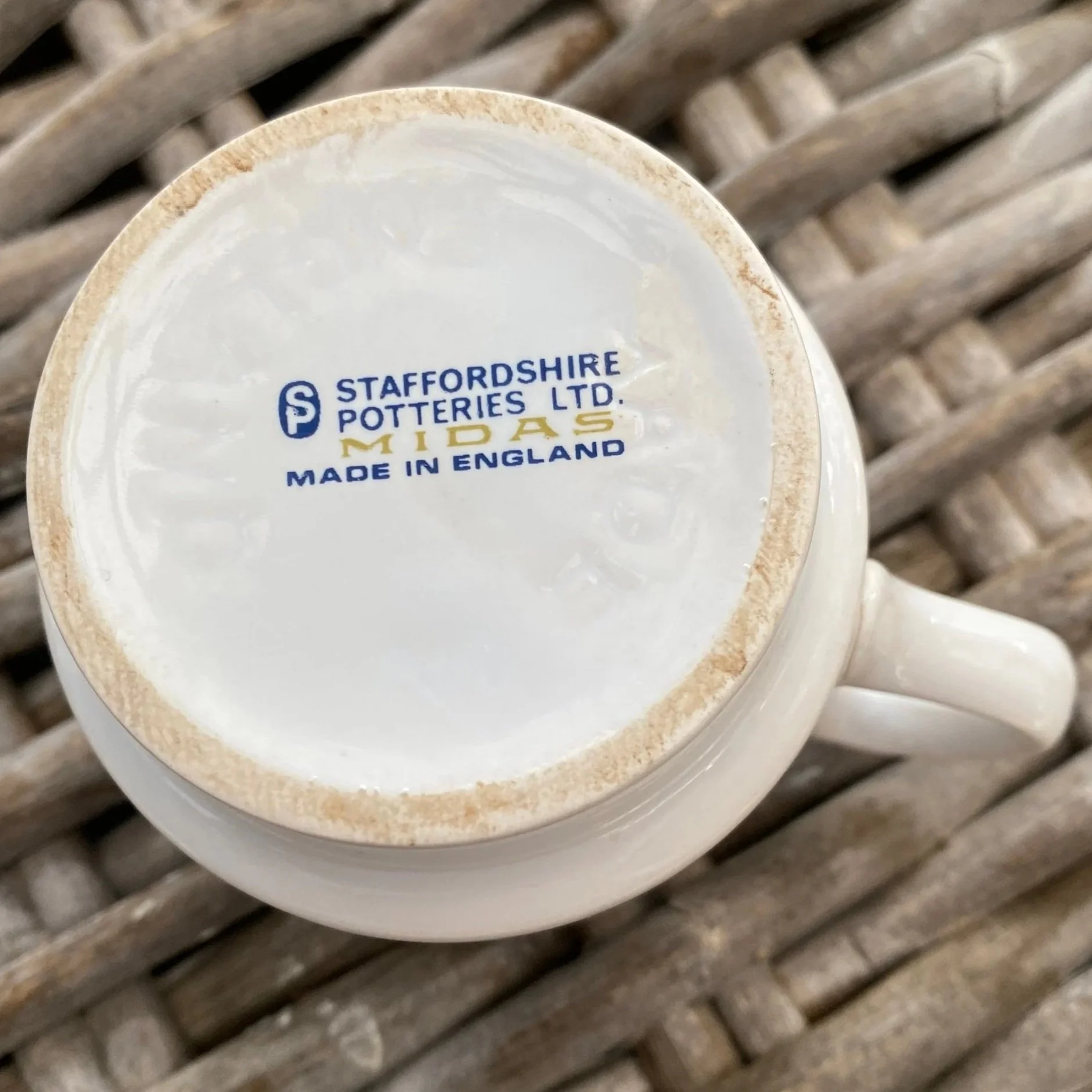 Underside showing Staffordshire Potteries Ltd. mark and wear ring