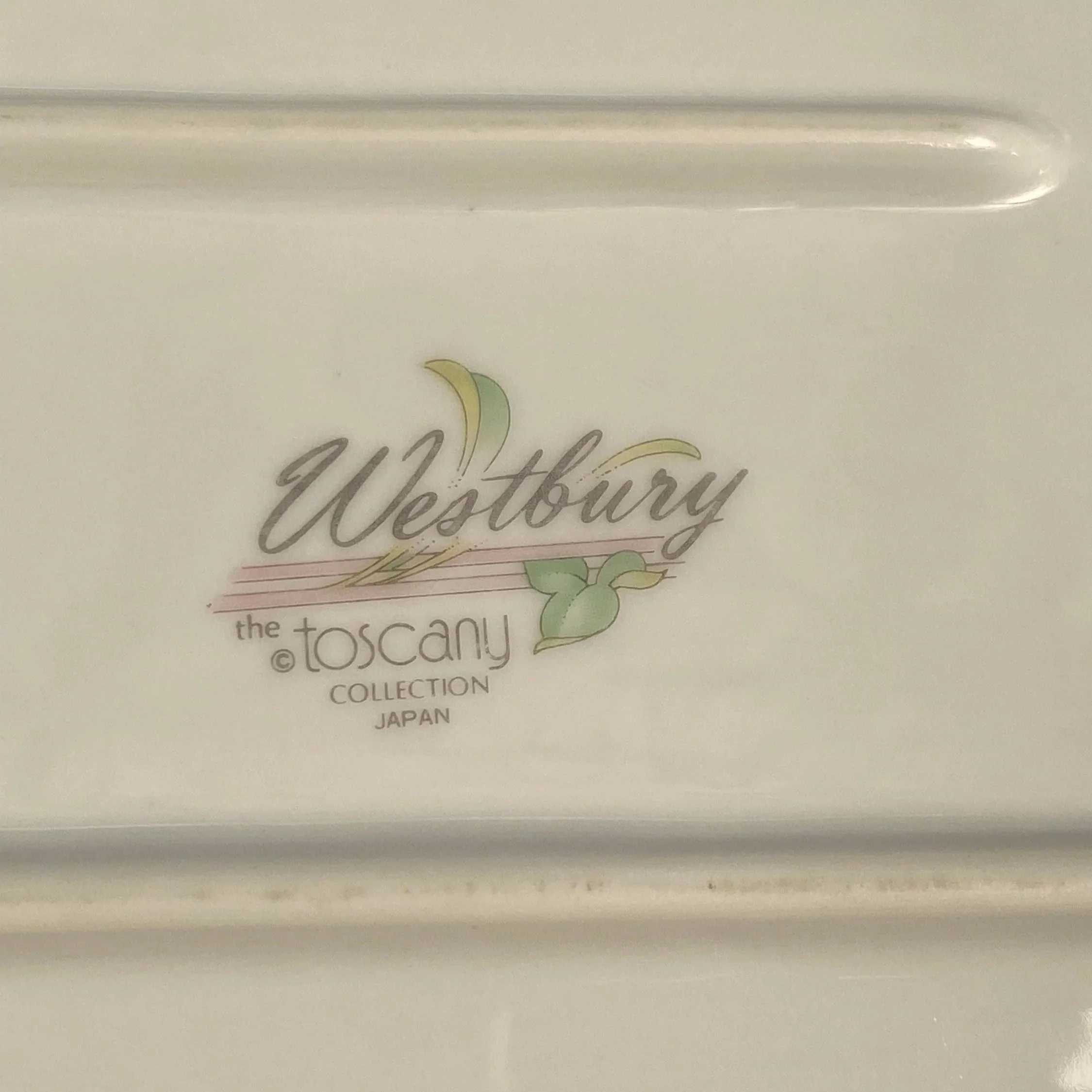 Close-up of the base mark reading Westbury The Toscany Collection Japan