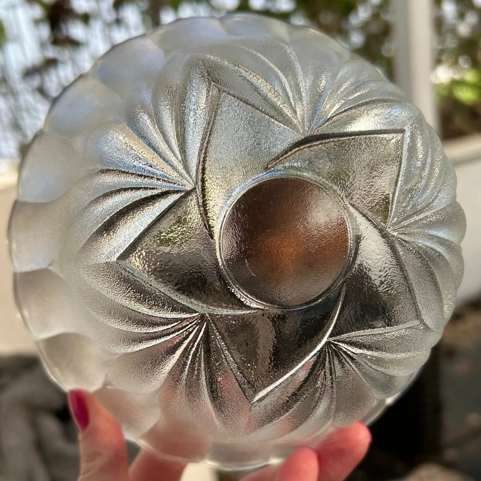 Close-up of central swirl detail on base