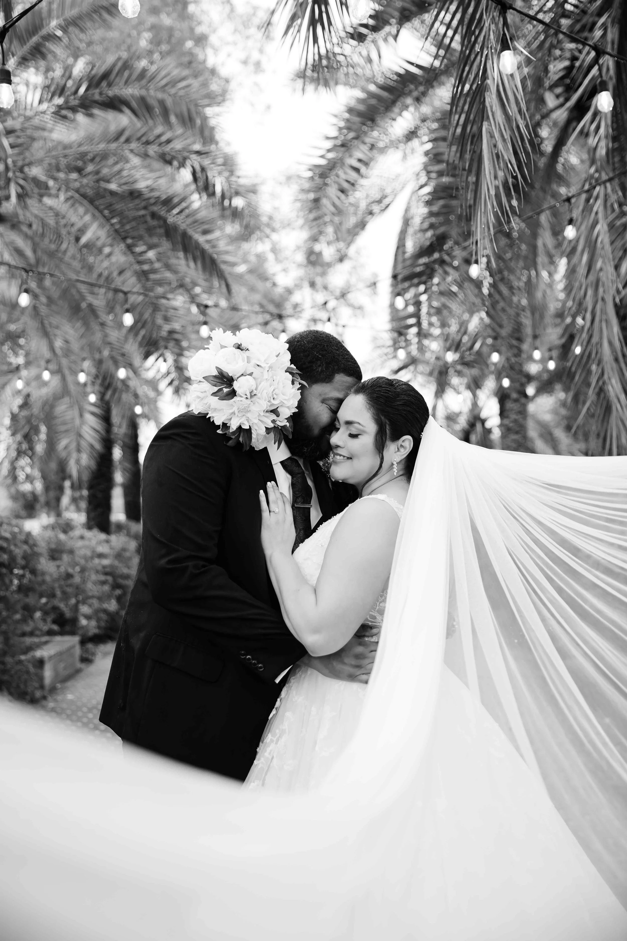 black and white photo with bridal veil flowing.jpg