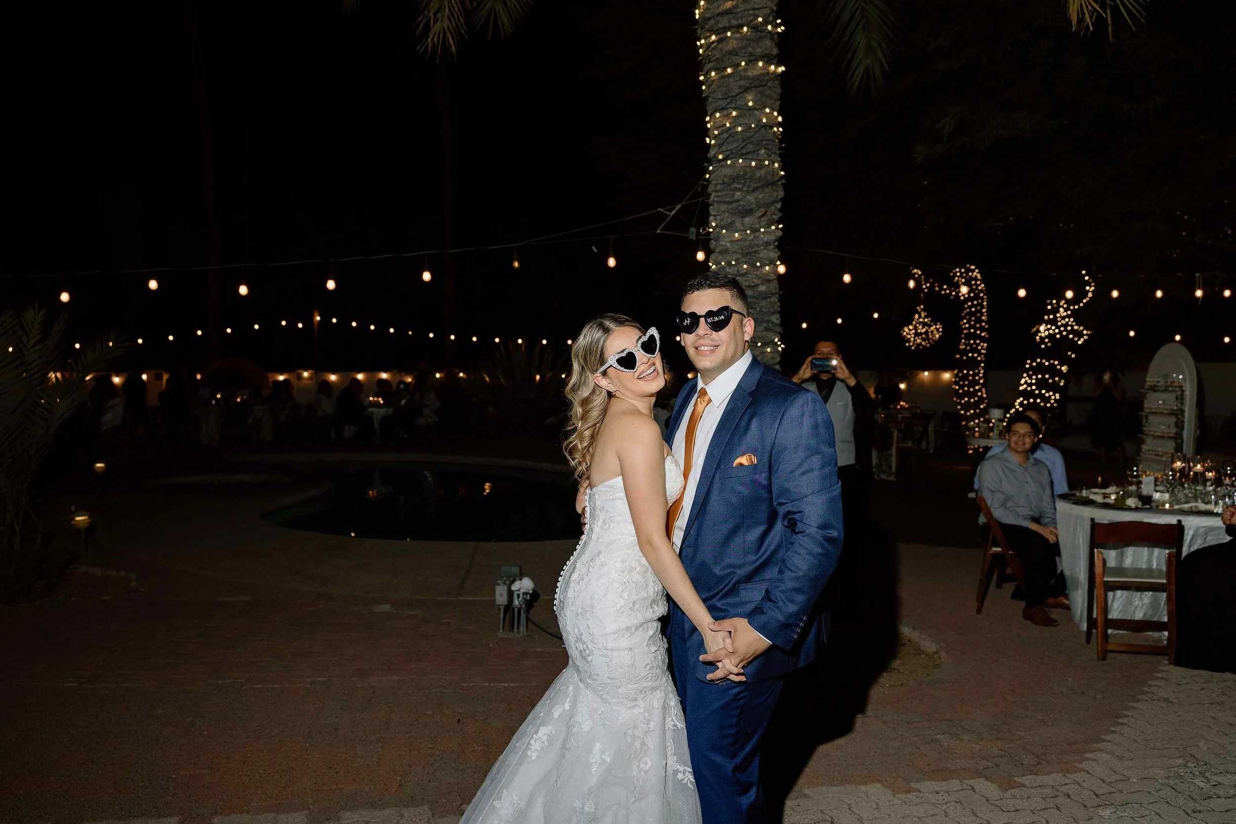 bridal couple with sunglasses at night.jpg