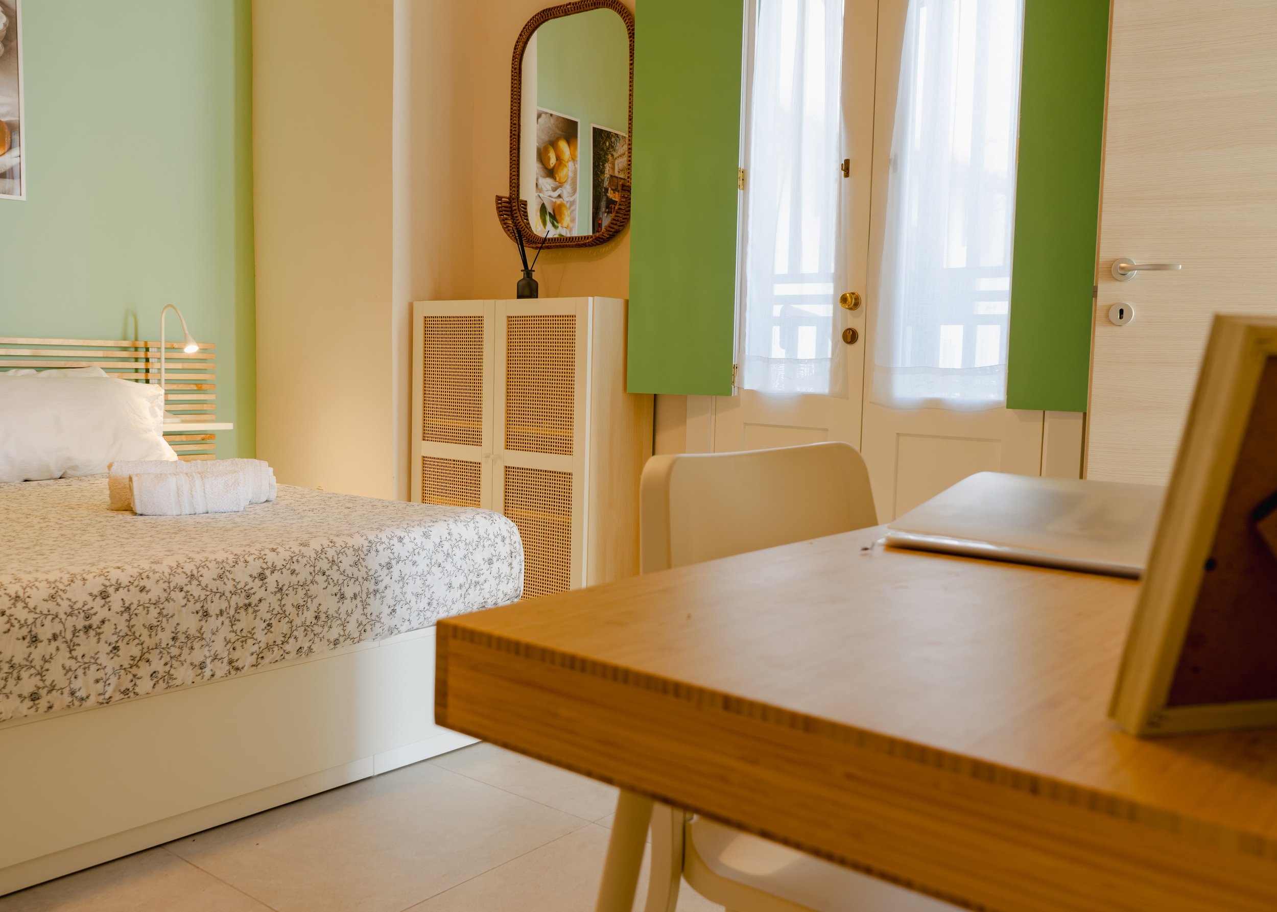 View over the desk and door window in the bedroom 