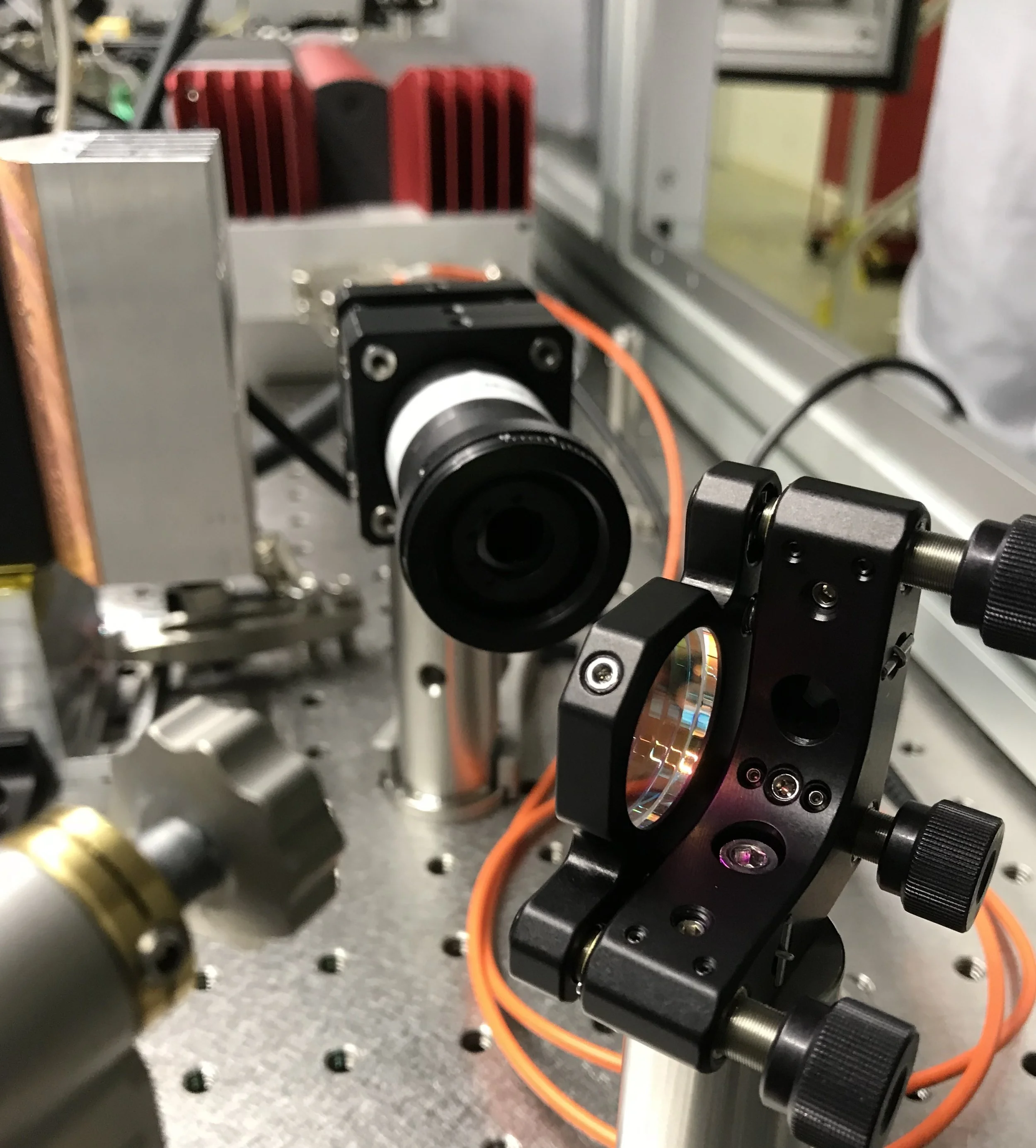 Precision mechanical design and optical hardware