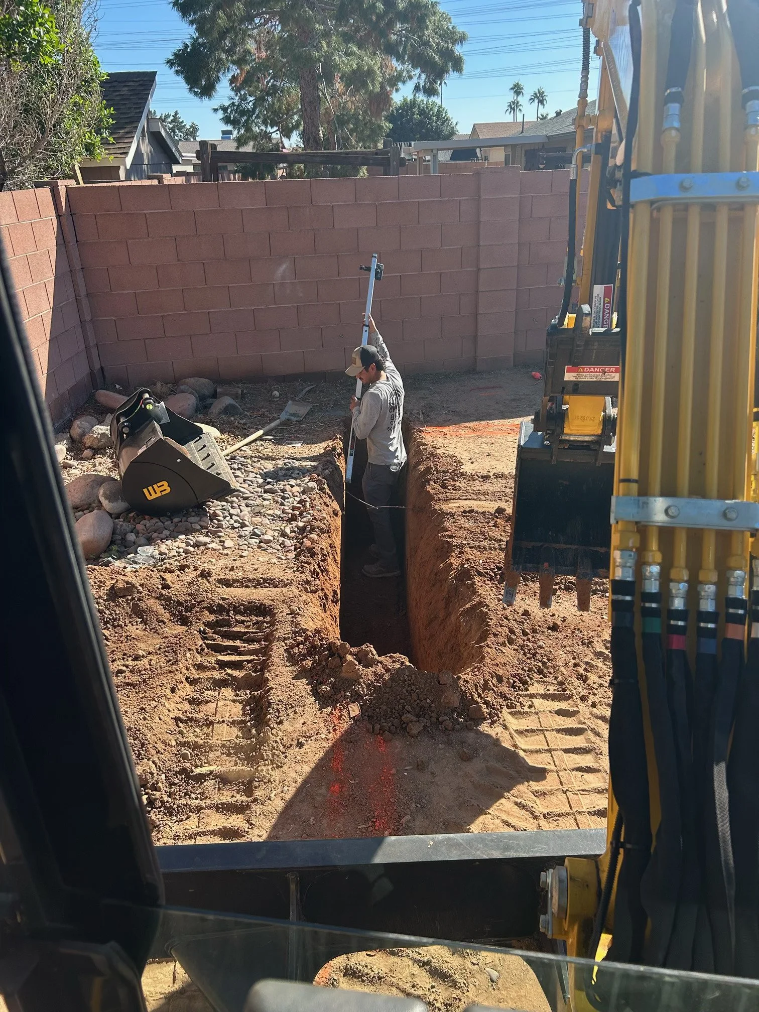 Excavation and grading for residential concrete project in Mesa AZ by Bridge Concrete
