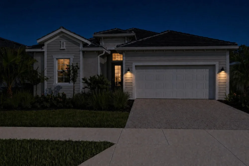 The same home at night with only porch lights
