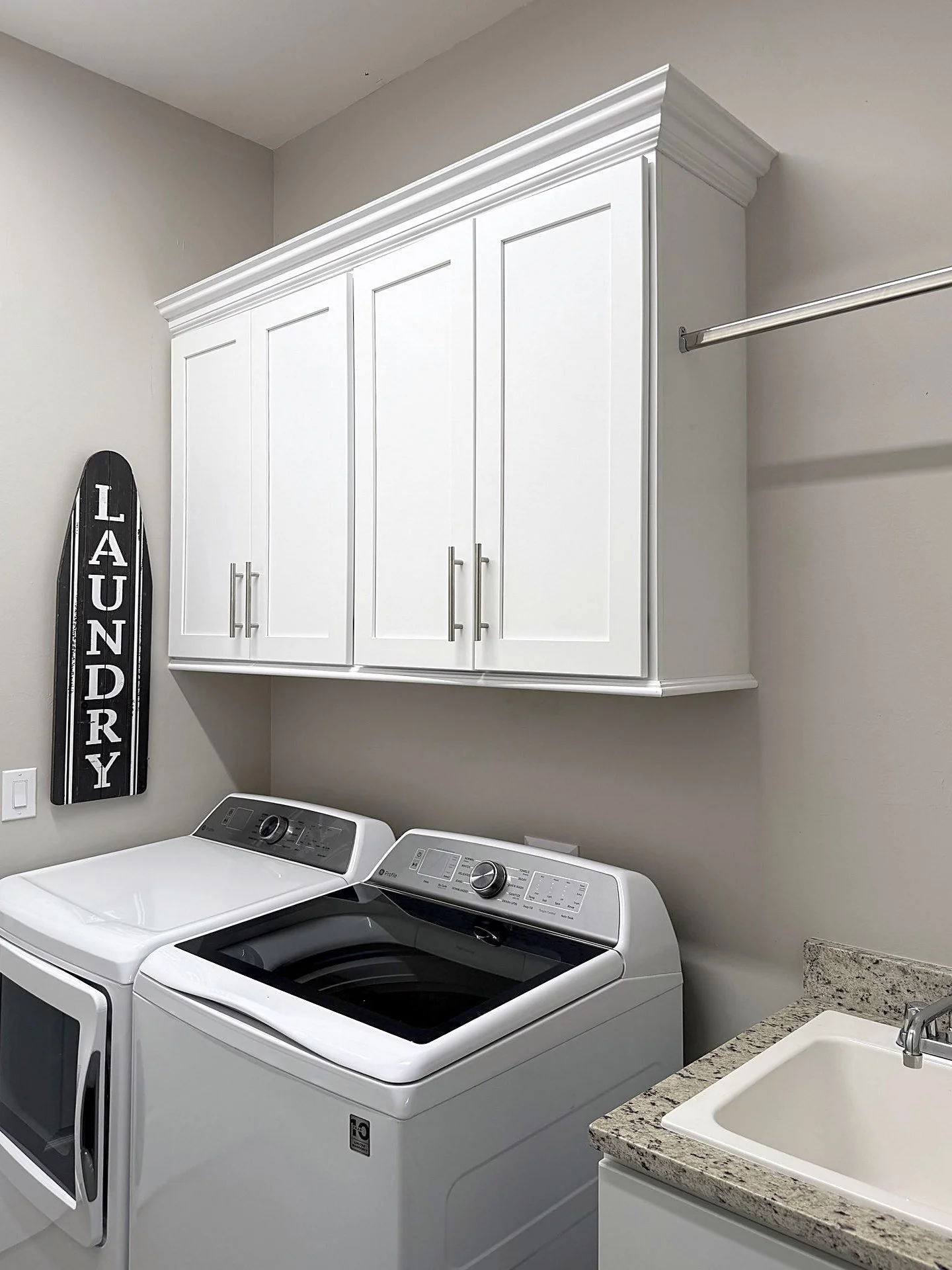 08-hideaway-laundry-cabinets-v2.jpg
