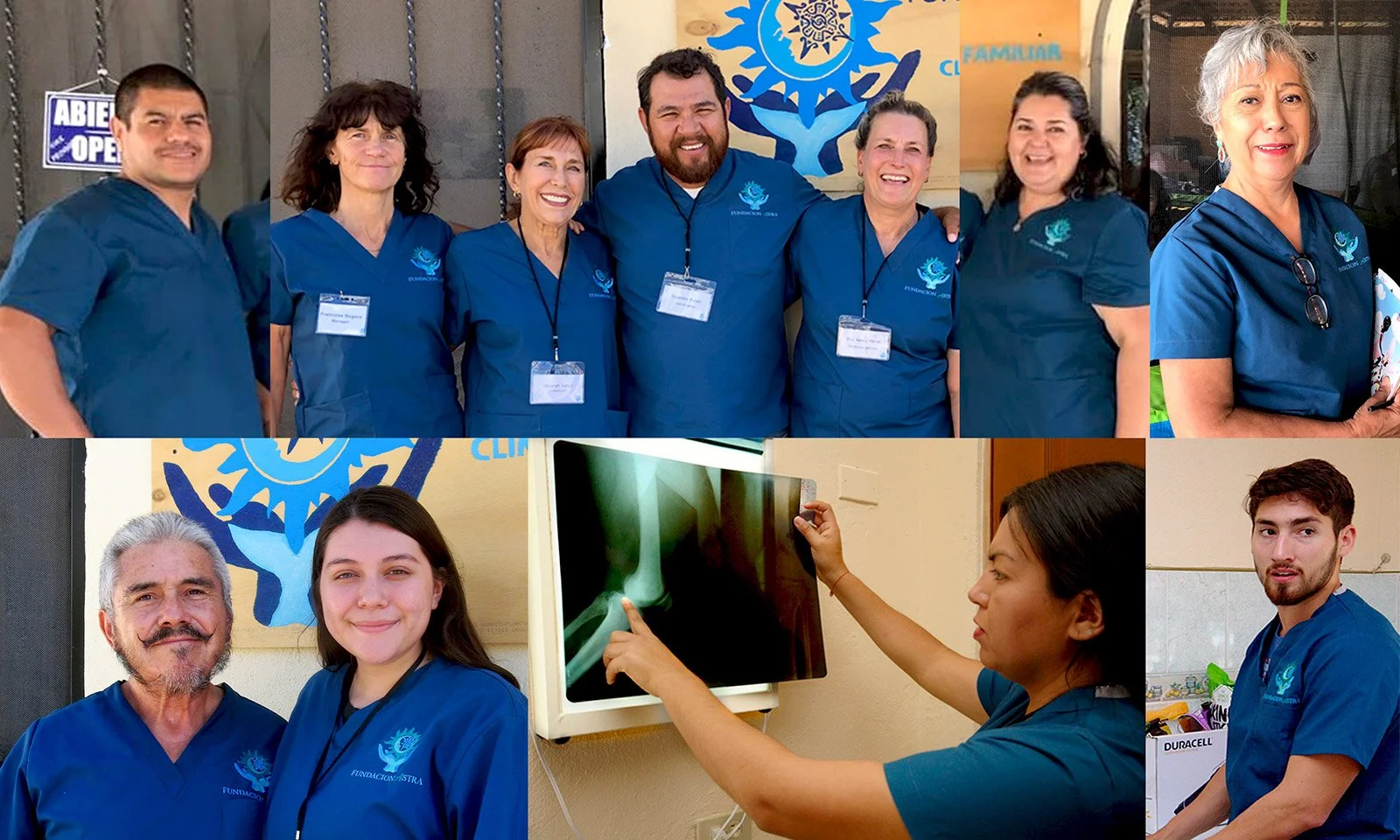 Group of healthcare professionals wearing blue scrubs, some smiling, standing together in a medical or healthcare facility.