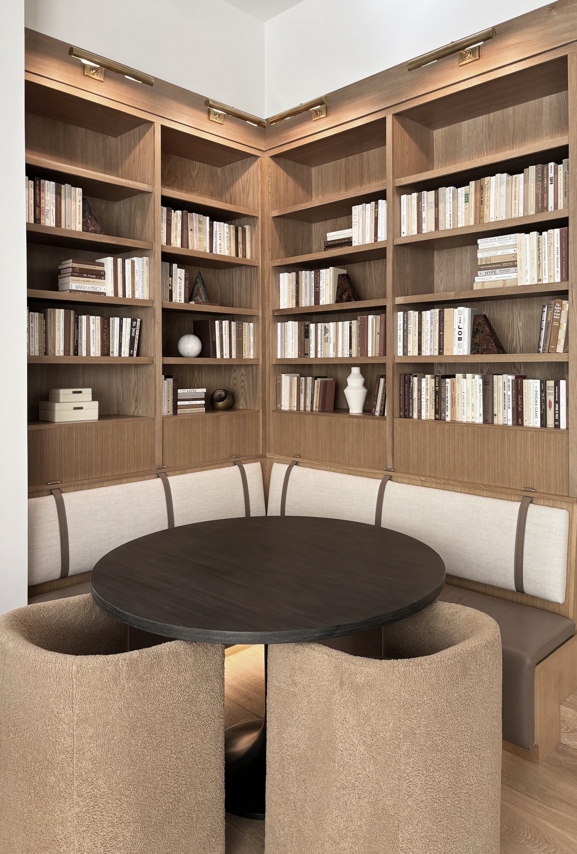library nook with leather straps on a built in bench.jpg