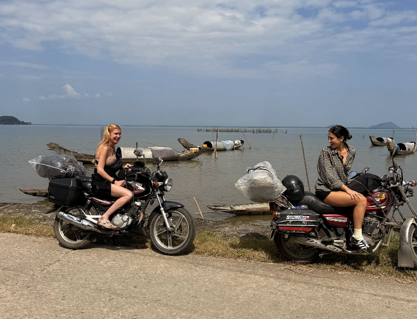 women motorbike vietnam river boats summer