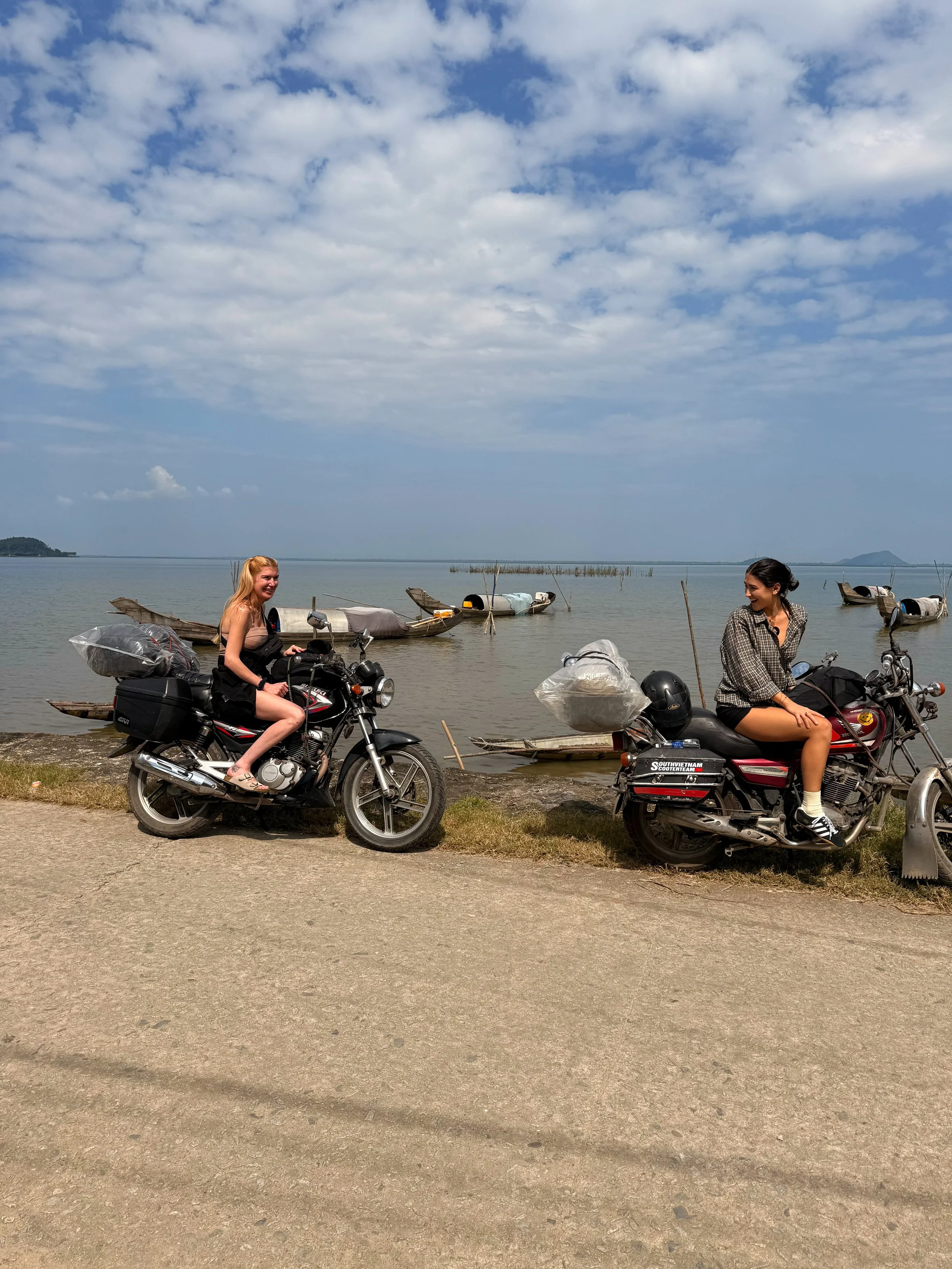 women motorbike lake adventure vietnam nature
