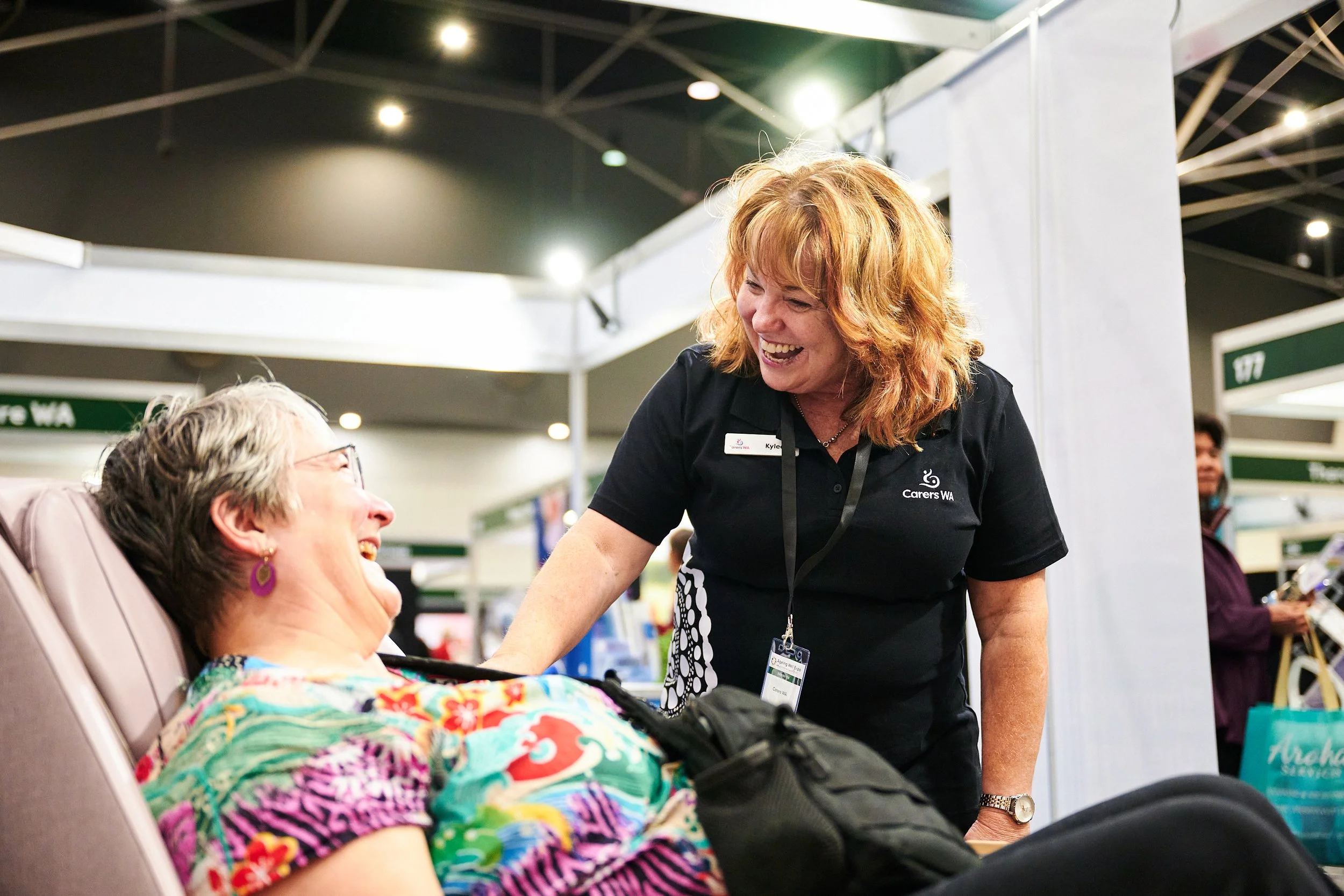 Exhibitor Interacting with customer