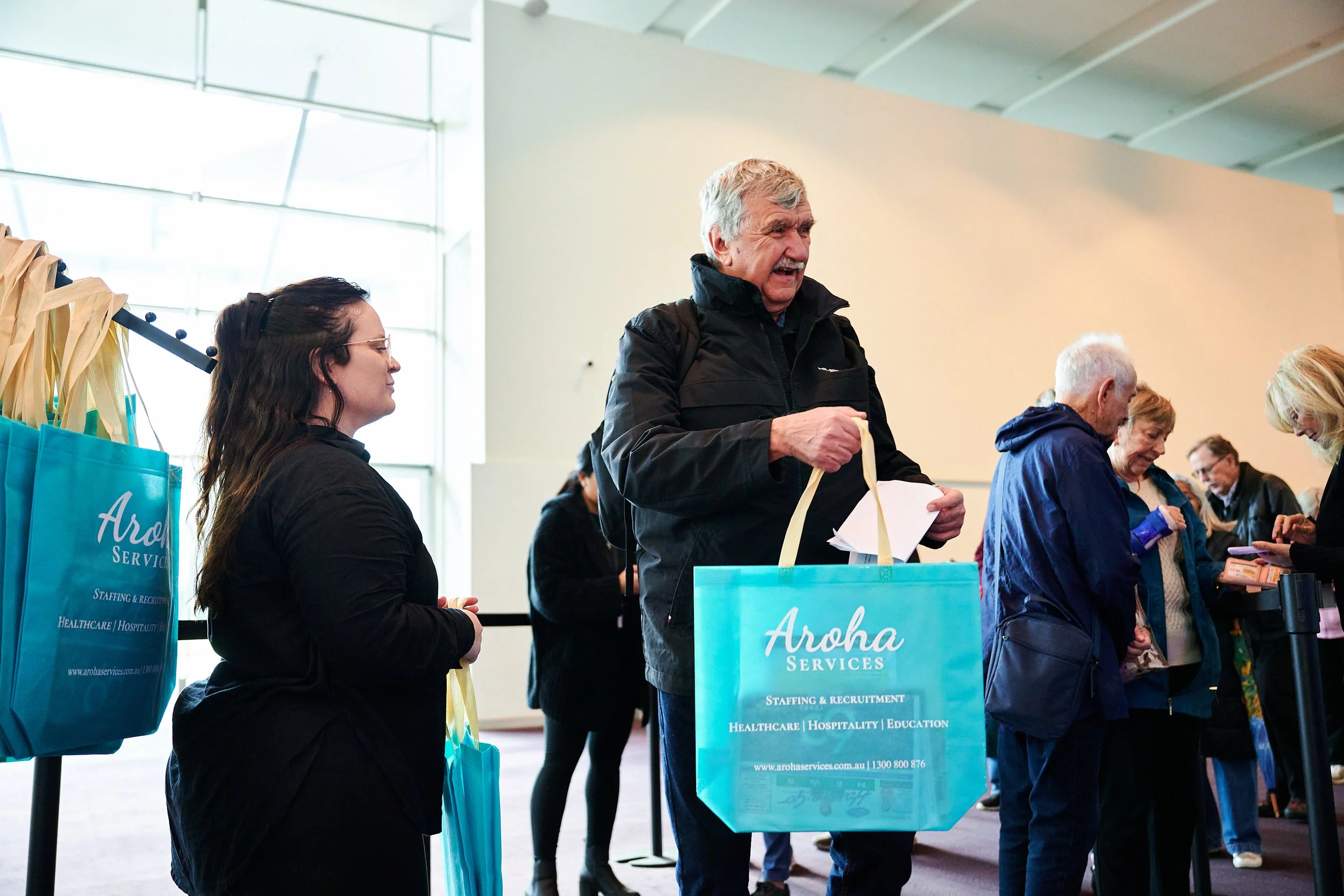 Man grabbing Aroha Showbag at Expo