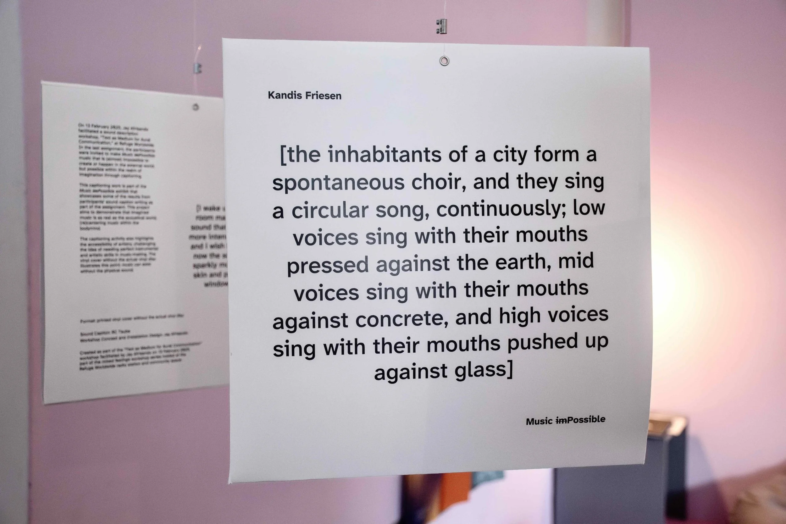 Vinyl 4: [the inhabitants of a city form a spontaneous choir, and they sing a circular song, continuously; low voices sing with their mouths pressed against the earth, mid voices sing with their mouths against concrete, and high voices sing with thei
