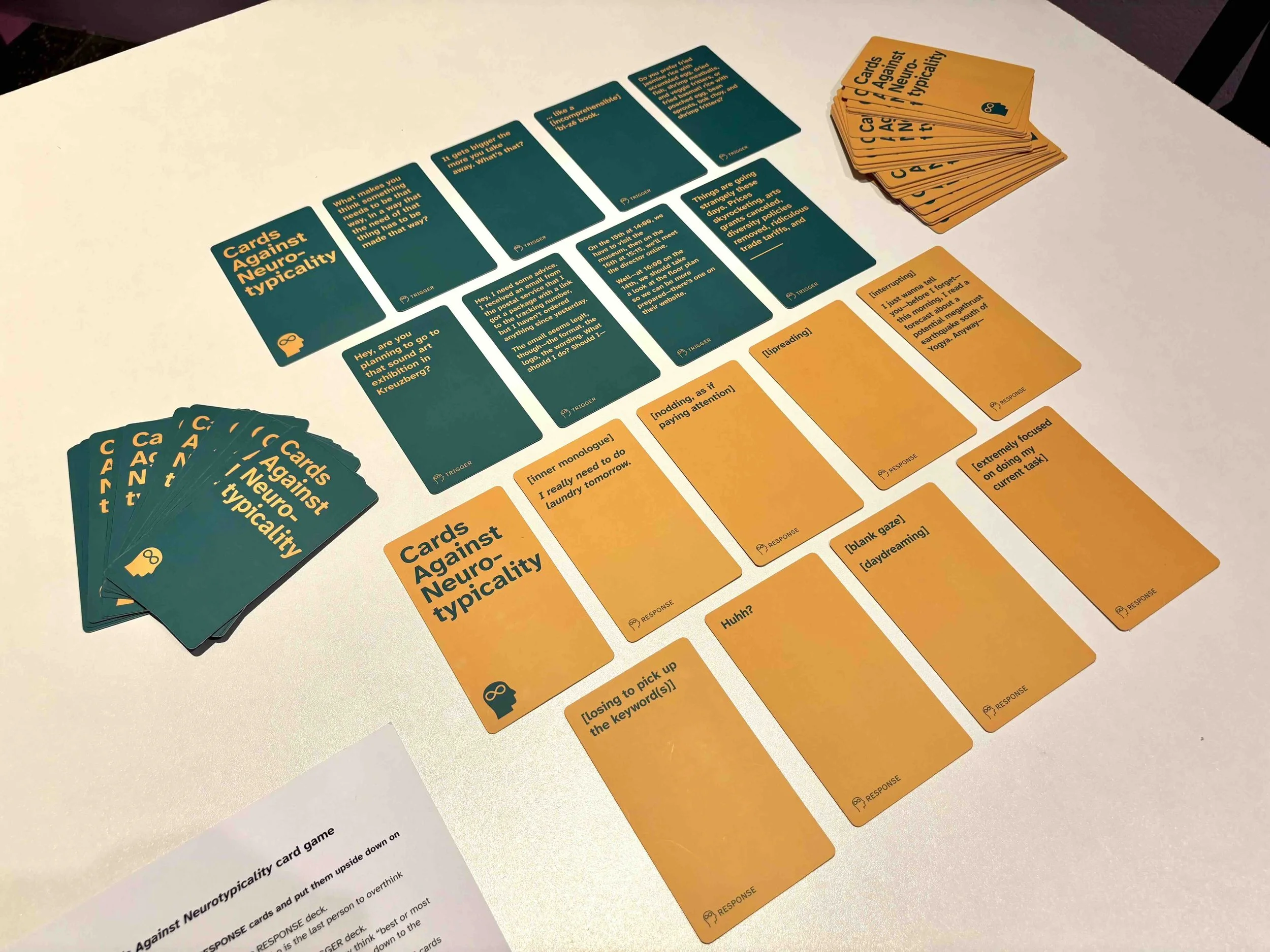 Some cards are opened and laid on a table. Photo: Jay Afrisando. Event: “In Conversation” exhibition, 2025.