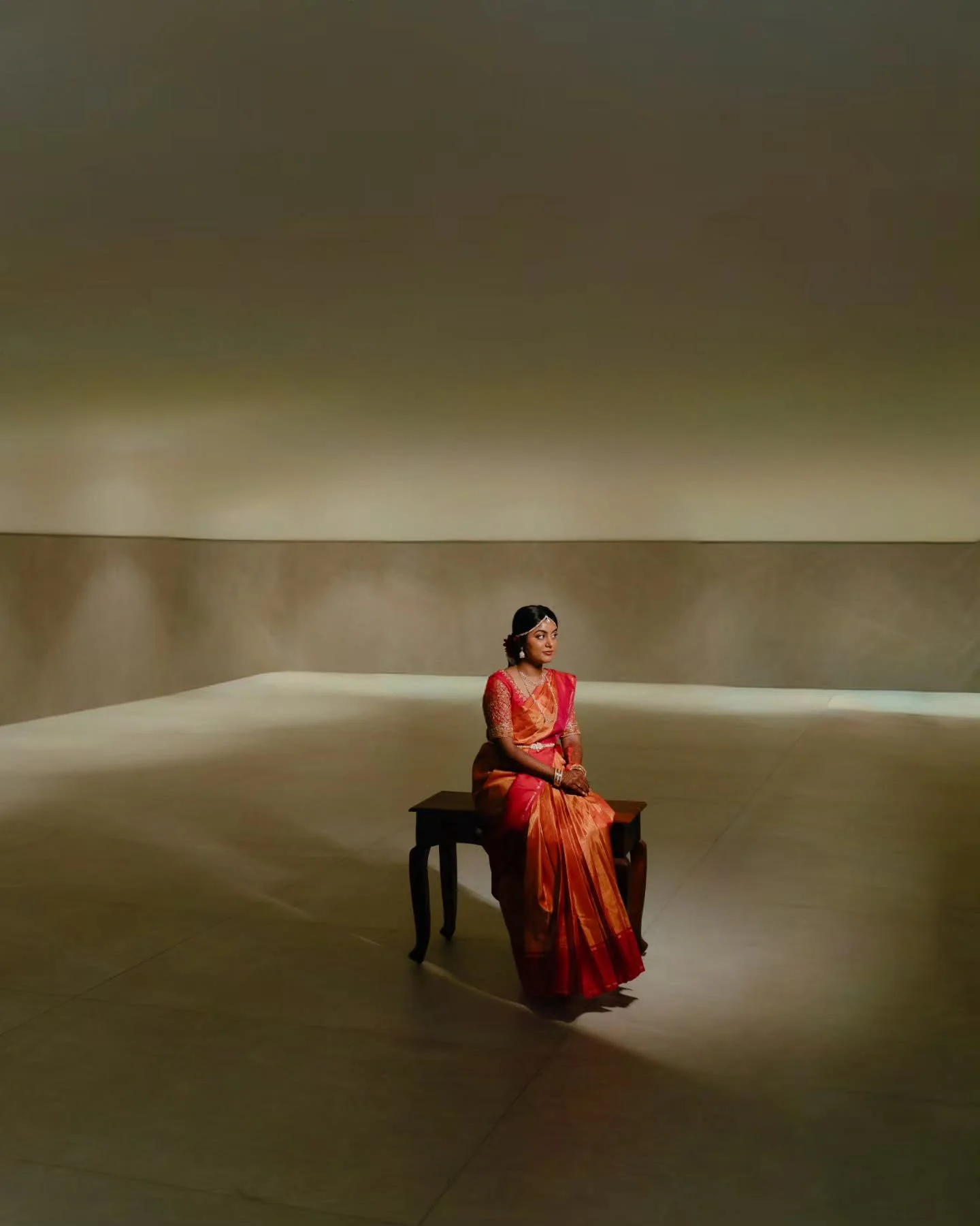 Luxury doesn&rsquo;t live in excess, it lives in intention. Sneha, seated in stillness, carrying centuries of tradition without trying to perform them. No elaborate set, no forced movement, just light falling exactly where it should and silence doing