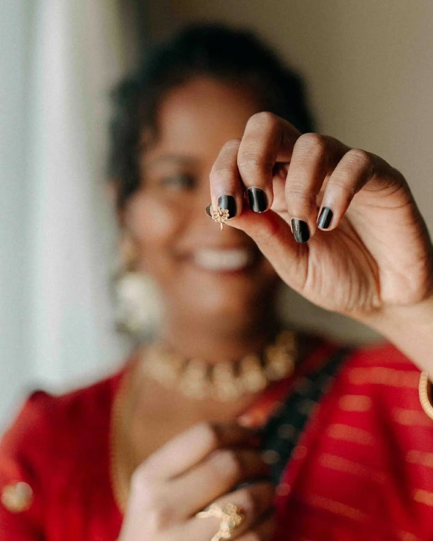 She lined her lips with black lip liner, colored her nails black for their civil union.

Just before the wedding they started a sweet kiss leaving a mark on fingers..

A small, quiet moment before everything officially began.

[civil union, intimate 