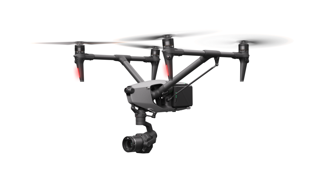 A professional drone with four propellers, a camera mounted underneath, and a sleek black and gray design.