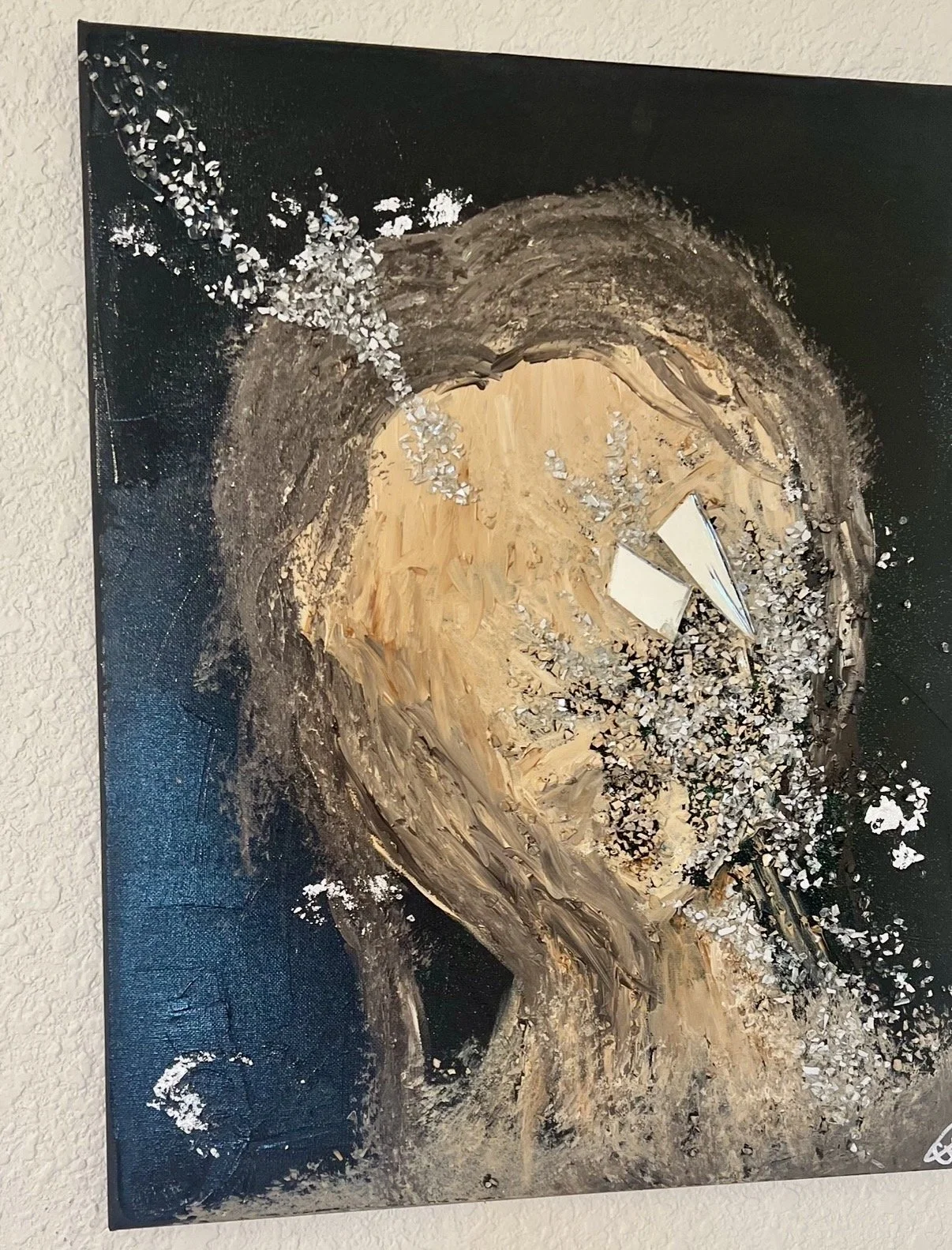Abstract portrait painting of a person with long hair, created with earthy tones, featuring glasses and textured silver and white accents.