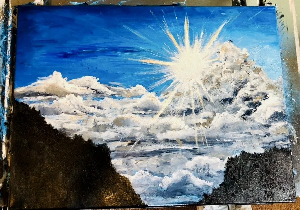 Painting of a bright sun shining over a sky filled with clouds, with dark silhouettes of mountains or trees at the bottom.