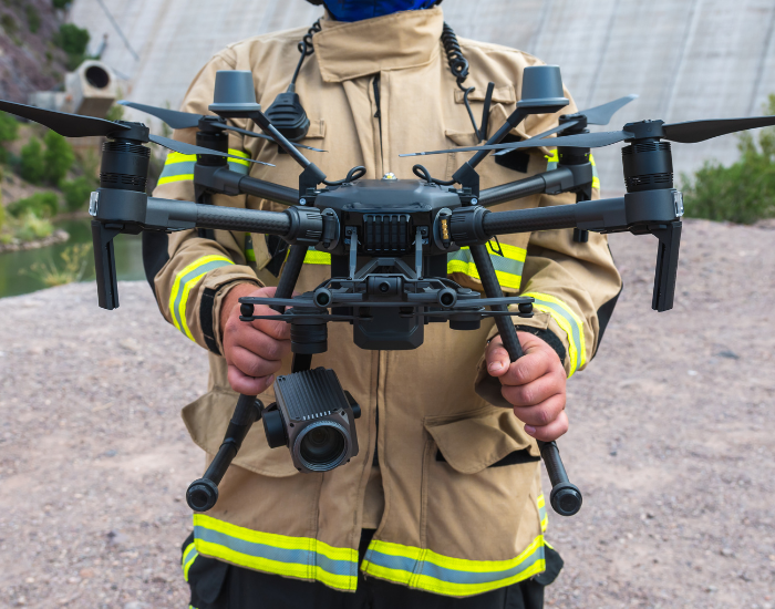 Getty Images a man carrying a big drone on his hands