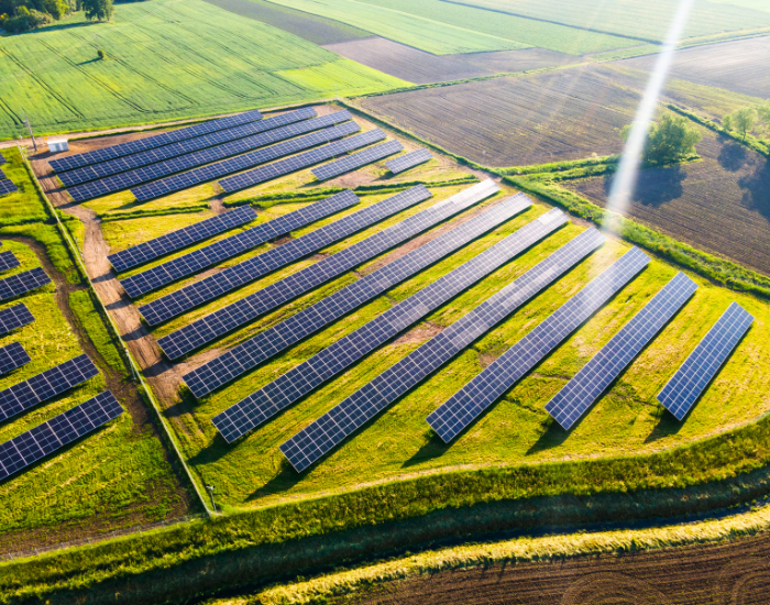 an aerial photo of a Solar Energy Farm in Fields
