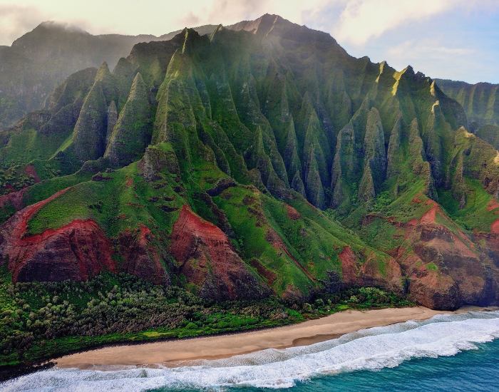 Getty Images aerial panoramic view of cliffs in hawai and the beach