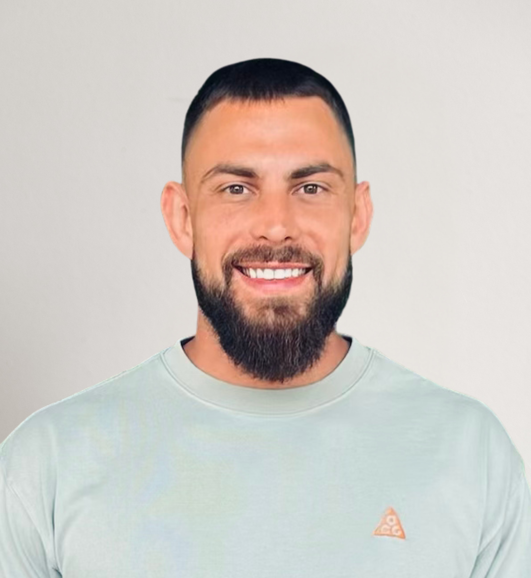 Life Coach with short brown hair smiling