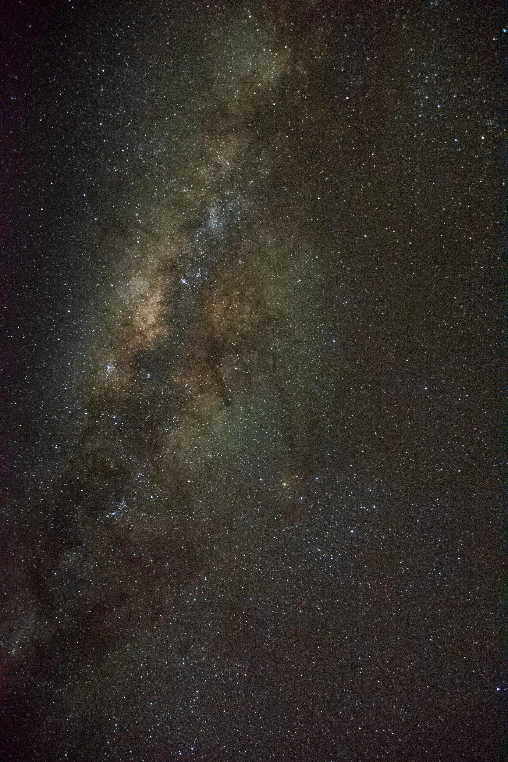 A clear night sky filled with countless stars and the Milky Way galaxy.