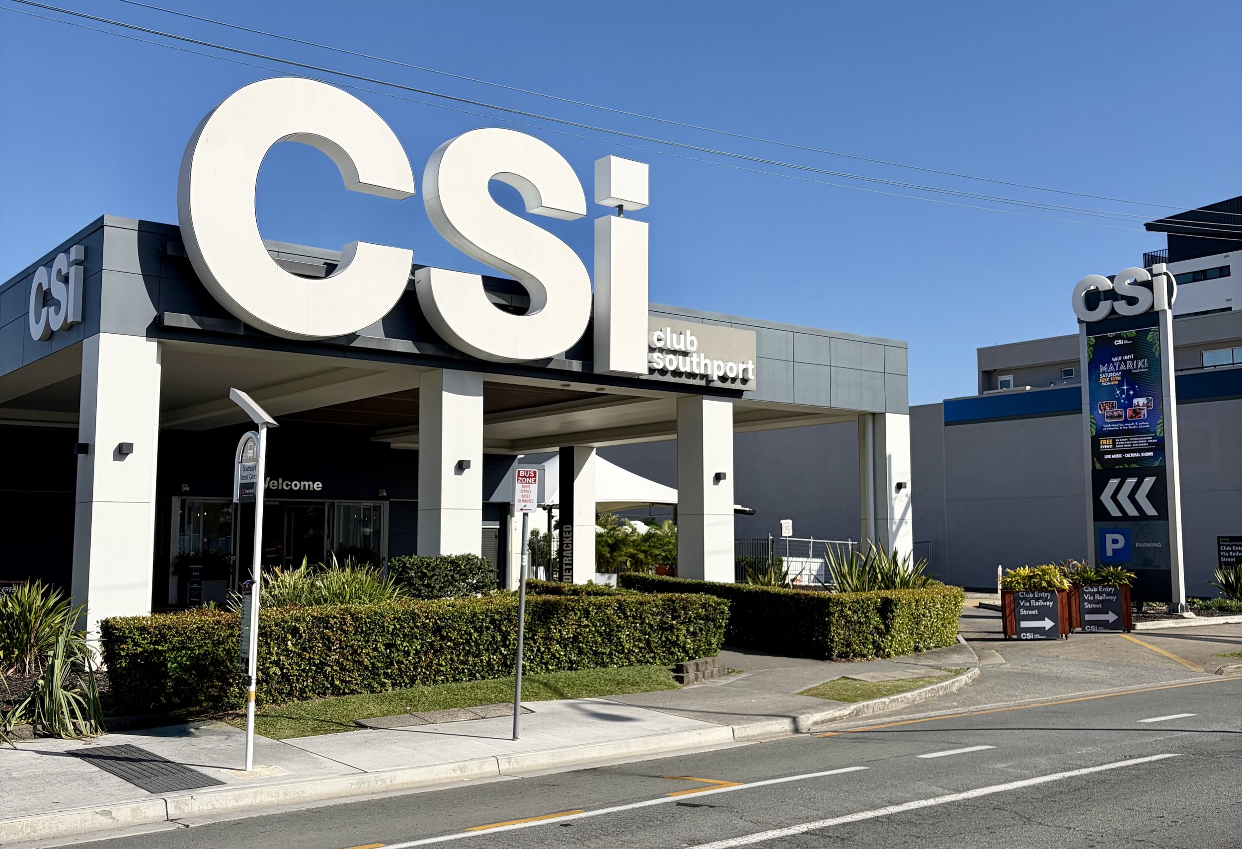 Street view of CSI Club Southport on a sunny day with no clouds. CSI is in huge letters on the front