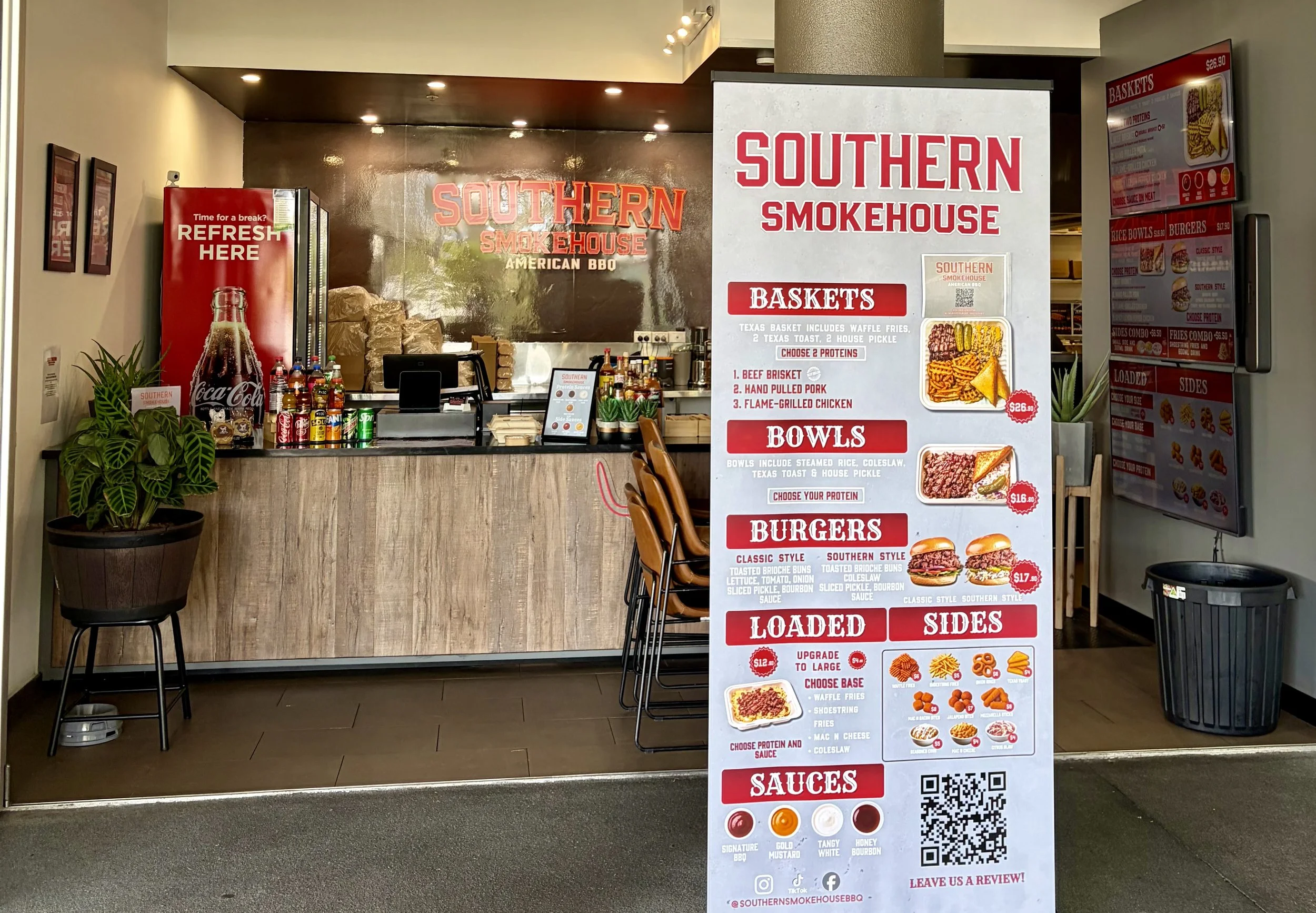 Southern Smokehouse main counter with menu boards in bright red lettering.