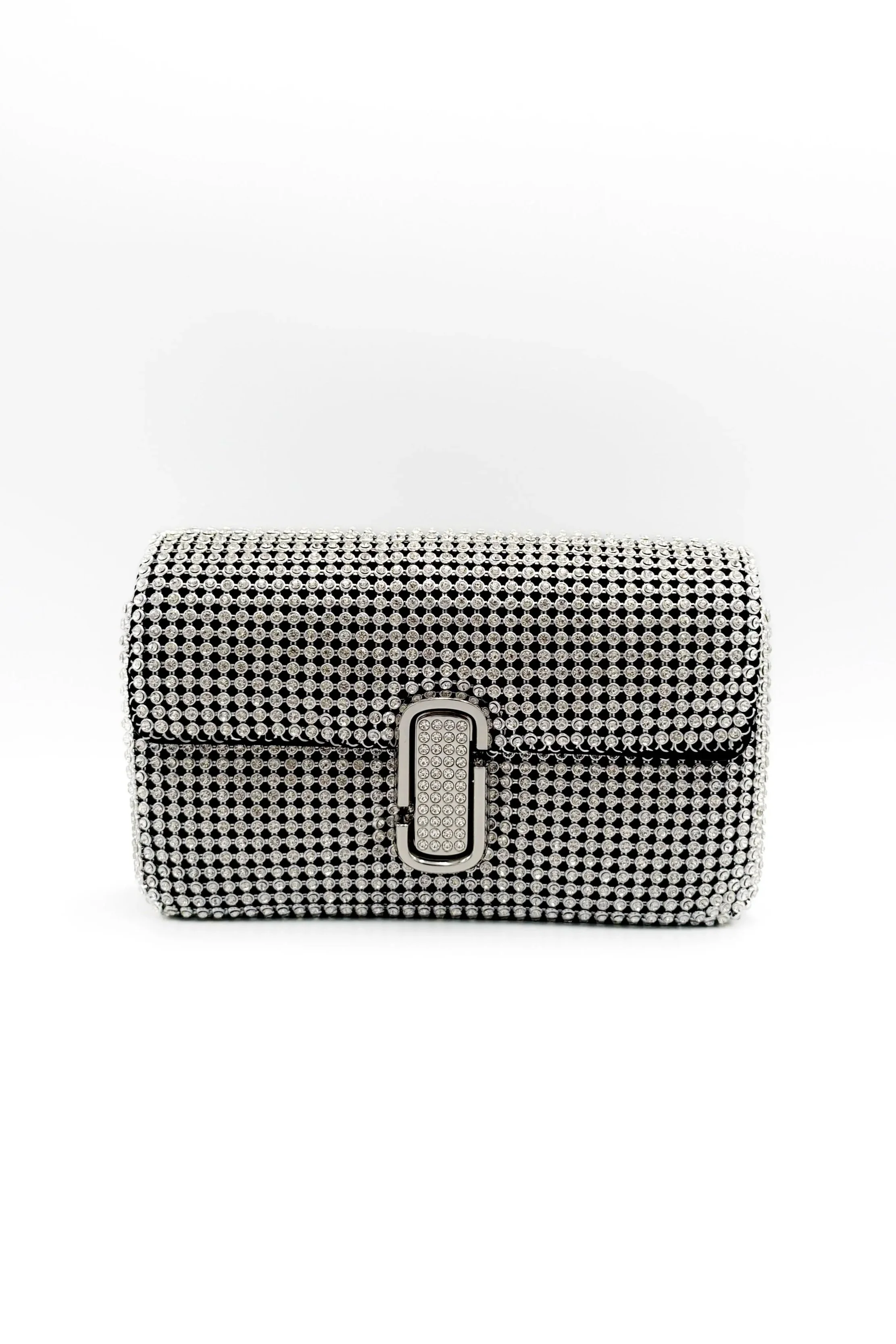 A black clutch purse covered in rhinestones with a silver and rhinestone clasp.