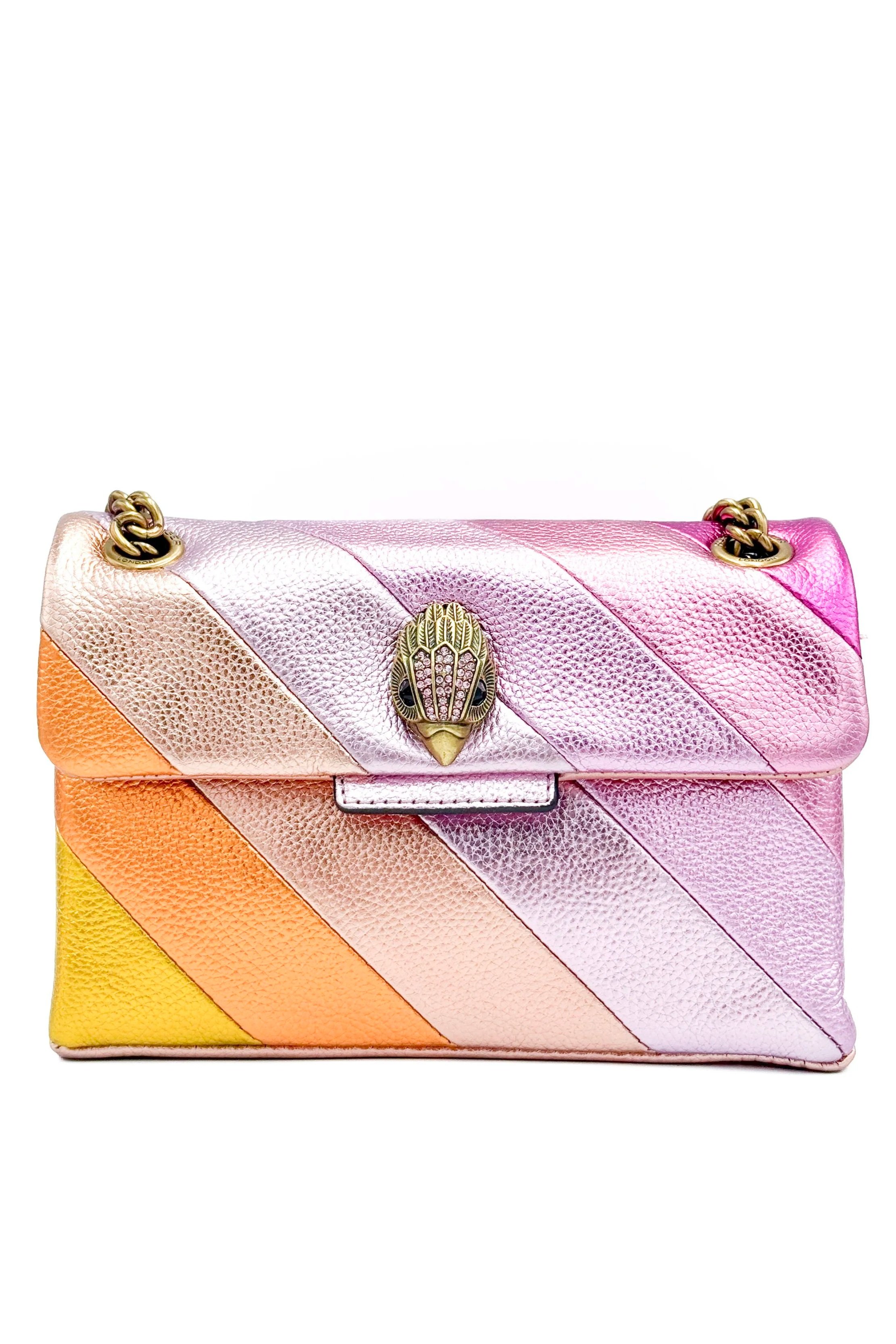 Colorful leather handbag with diagonal pastel stripes and a gold decorative clasp in the shape of a pineapple.